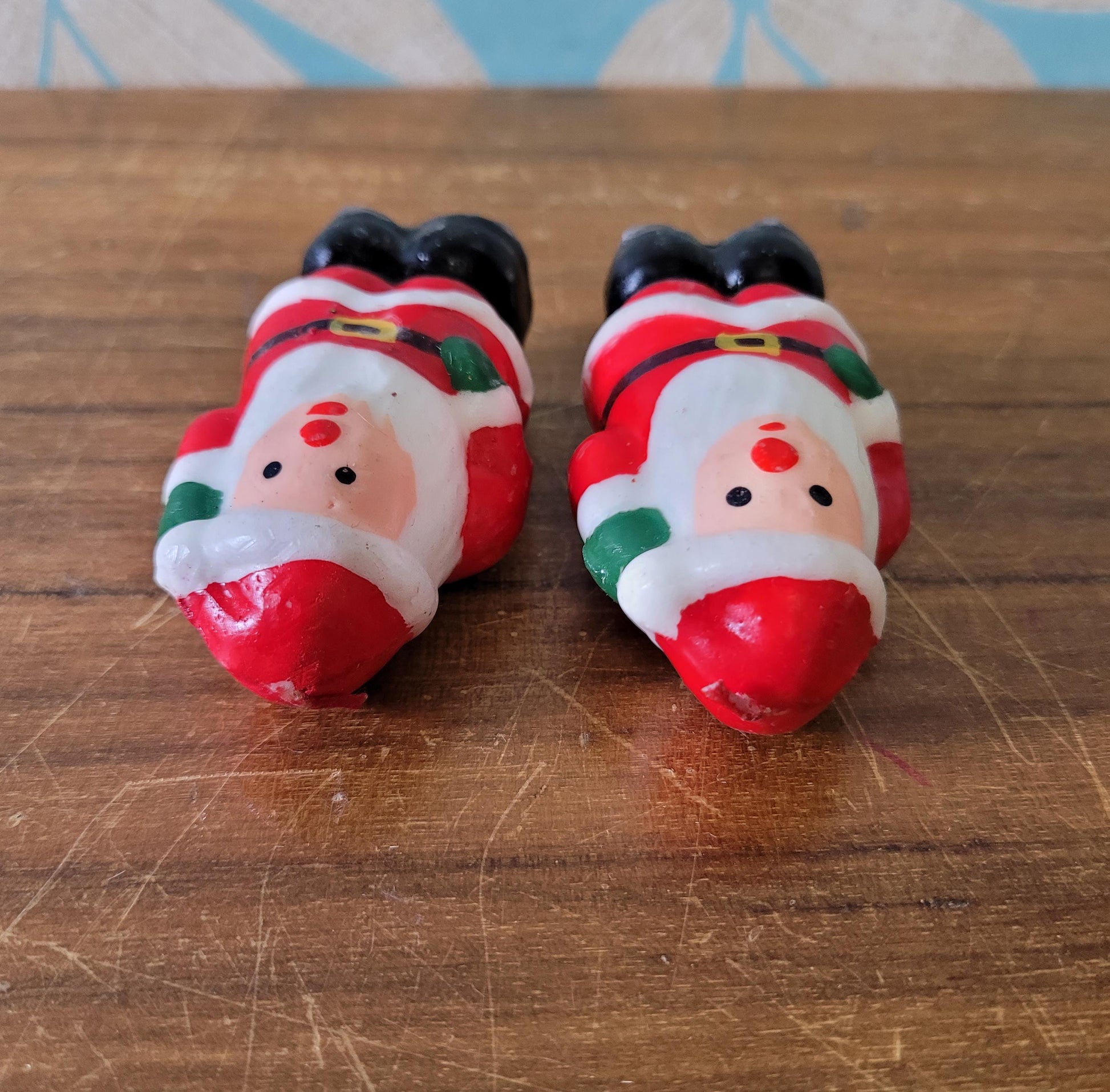 Four vintage novelty Santa, & Snowman miniature candles