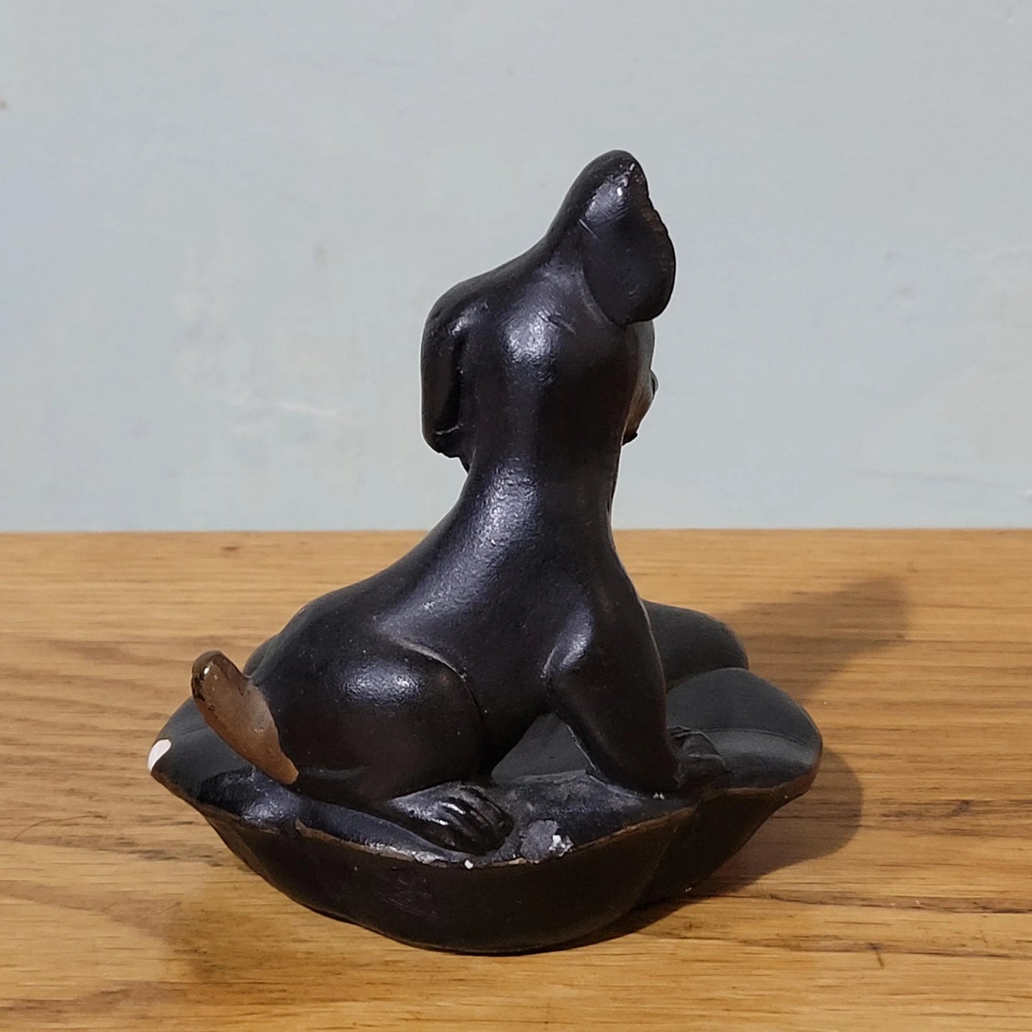 Rare Art Deco black ceramic 'Bonzo-esque' puppy ashtray/trinket dish, gold-tipped tail
