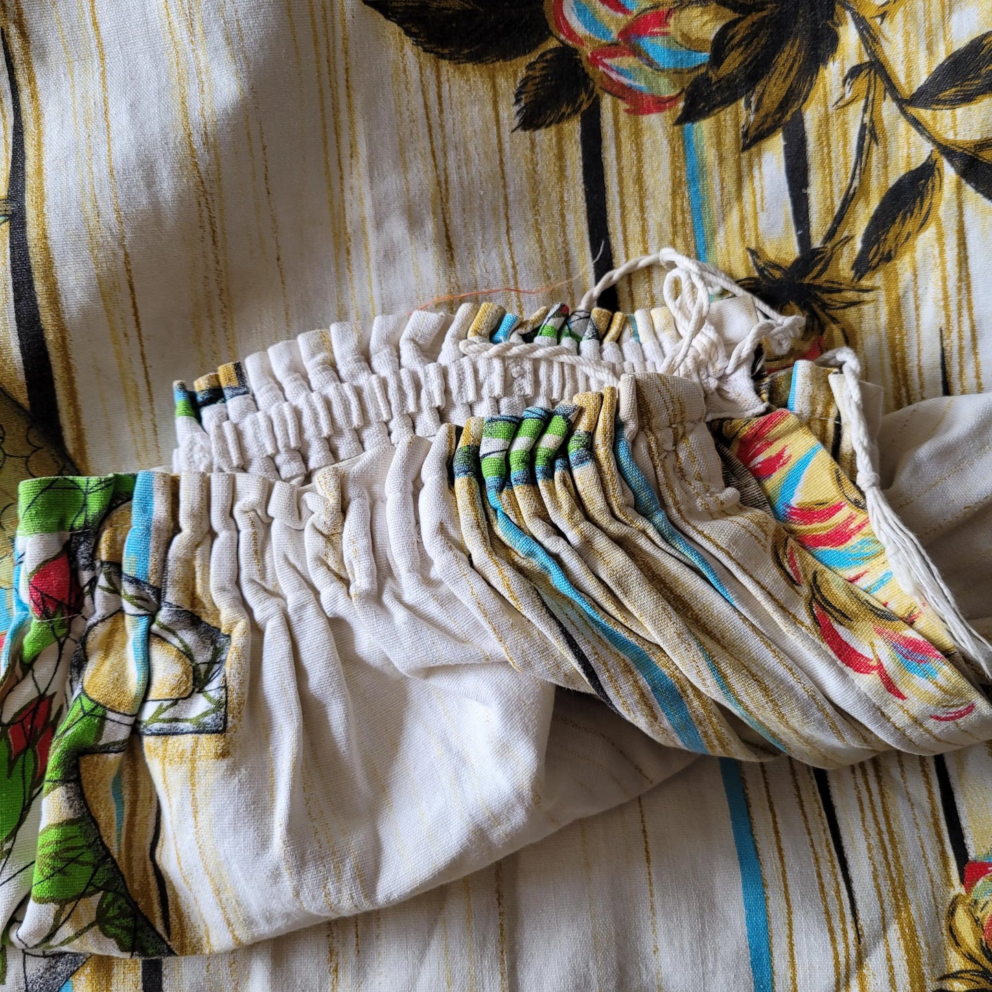 Pair of 1960s Sunresista "Ceramic" (flower & vases) pattern cotton curtains, 66" x 77"