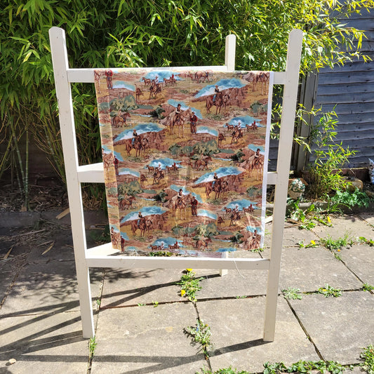 Retro Timeless Treasures 'West' cowboy fabric piece, 42" x 42"