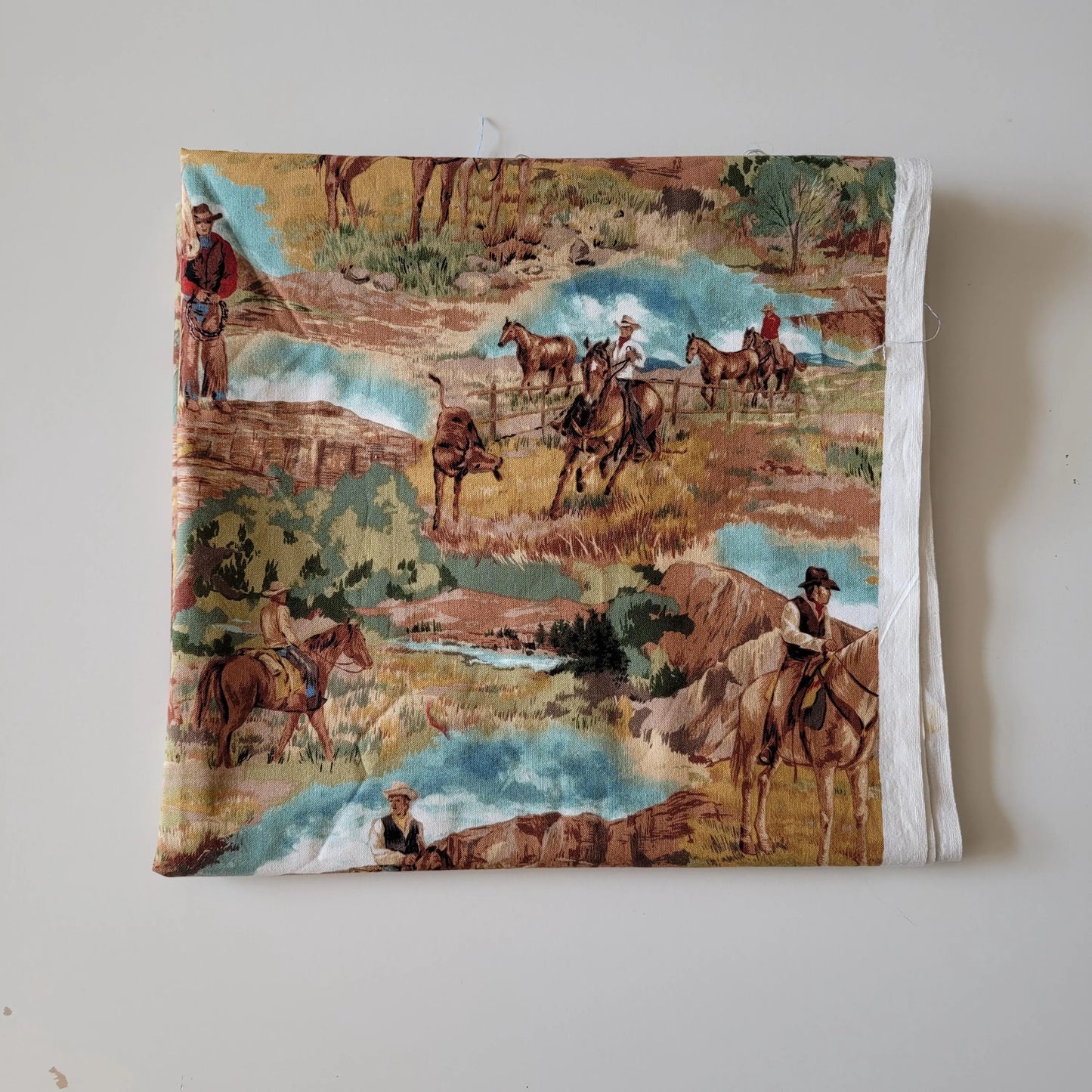 Retro Timeless Treasures 'West' cowboy fabric piece, 42" x 42"