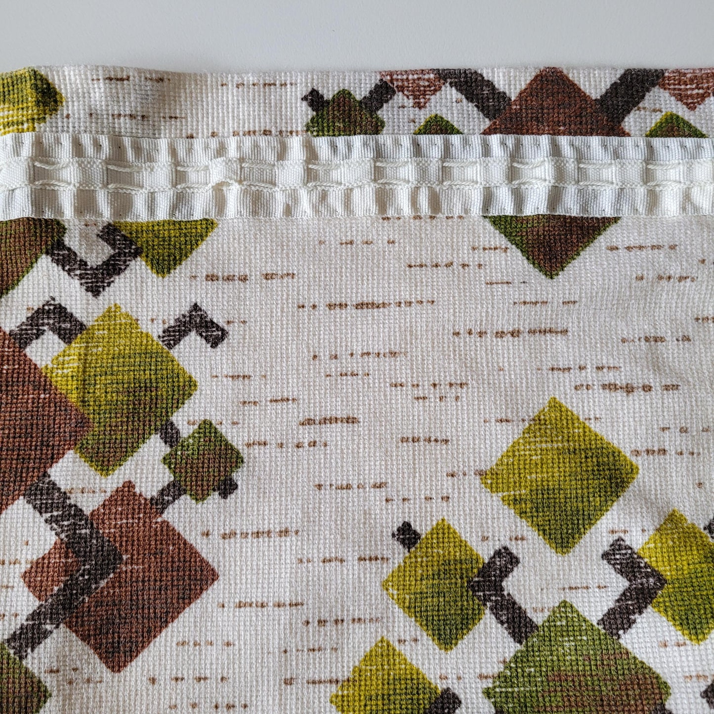 Pair of 1970s geometric abstract print viscose/poly curtains, 40" x 70"