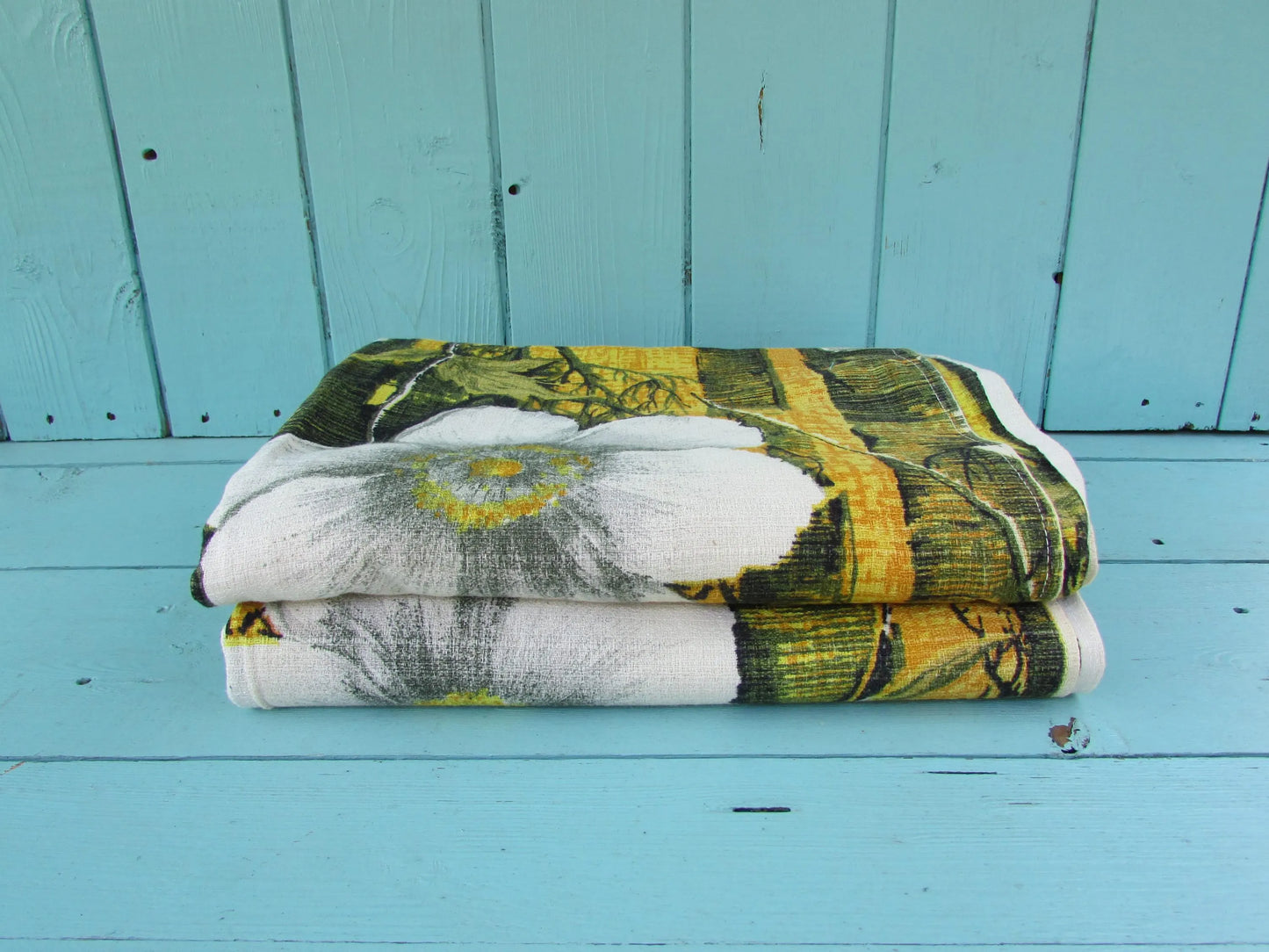 Pair of 1970s white flowers on yellow & black barkcloth curtains, 46" x 64"