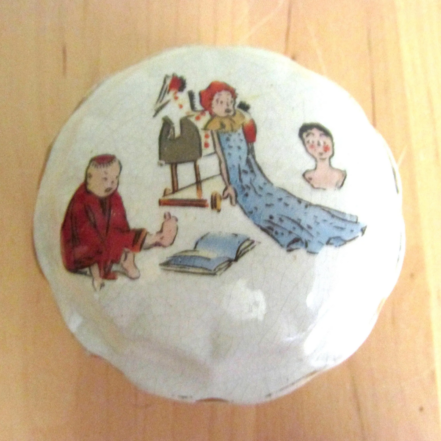 Vintage gilt edged porcelain powder jar with nursery scene transfer detail