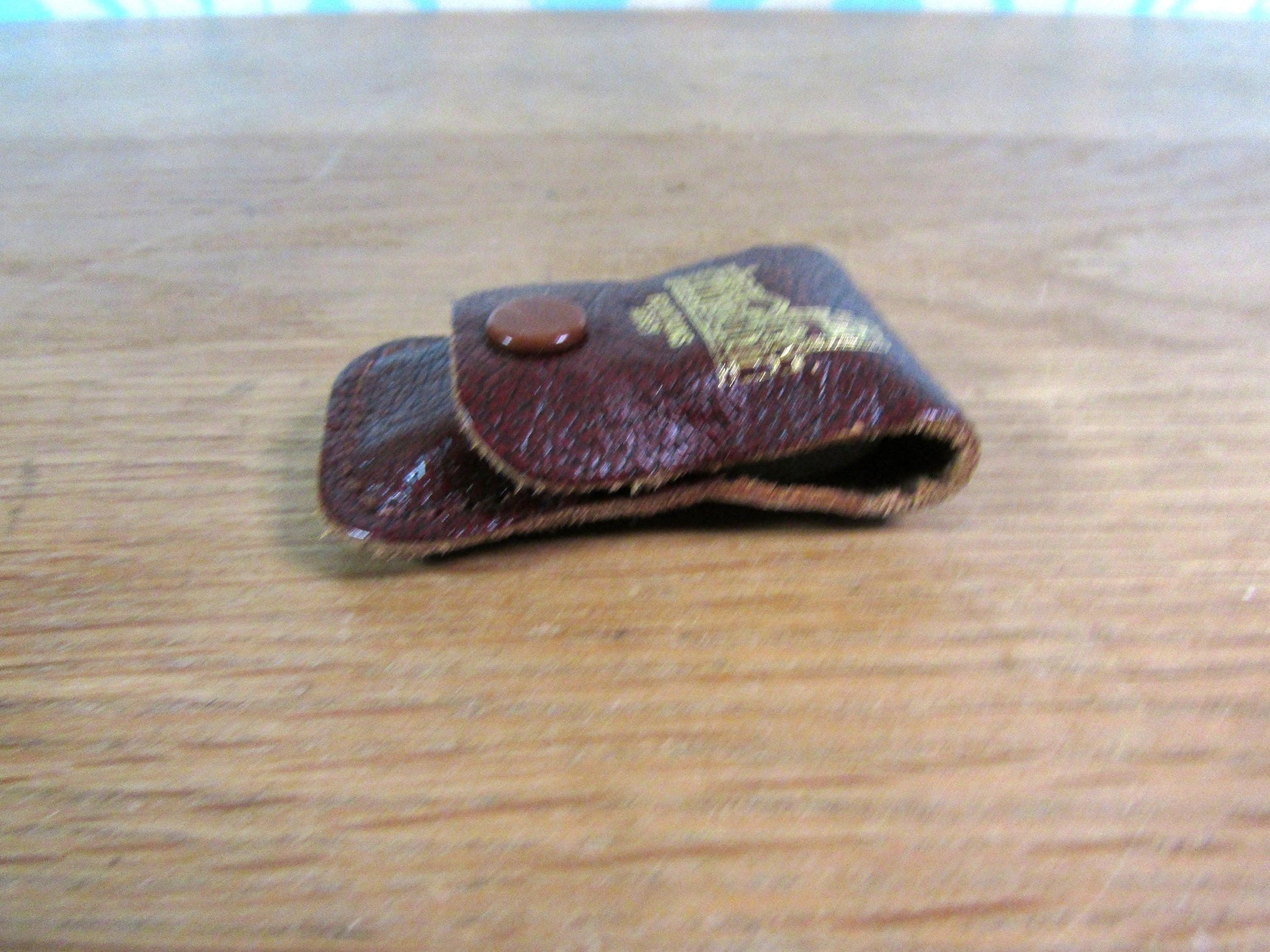 Vintage sewing tape measure in souvenir "Fountains Abbey" leather pouch
