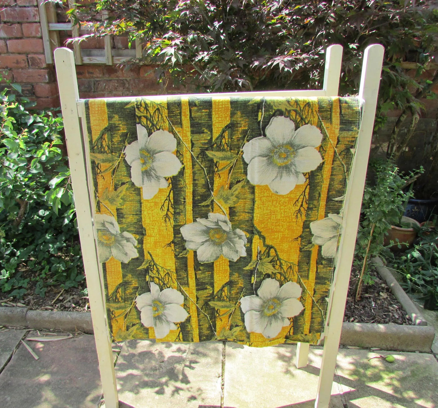Pair of 1970s white flowers on yellow & black barkcloth curtains, 46" x 64"