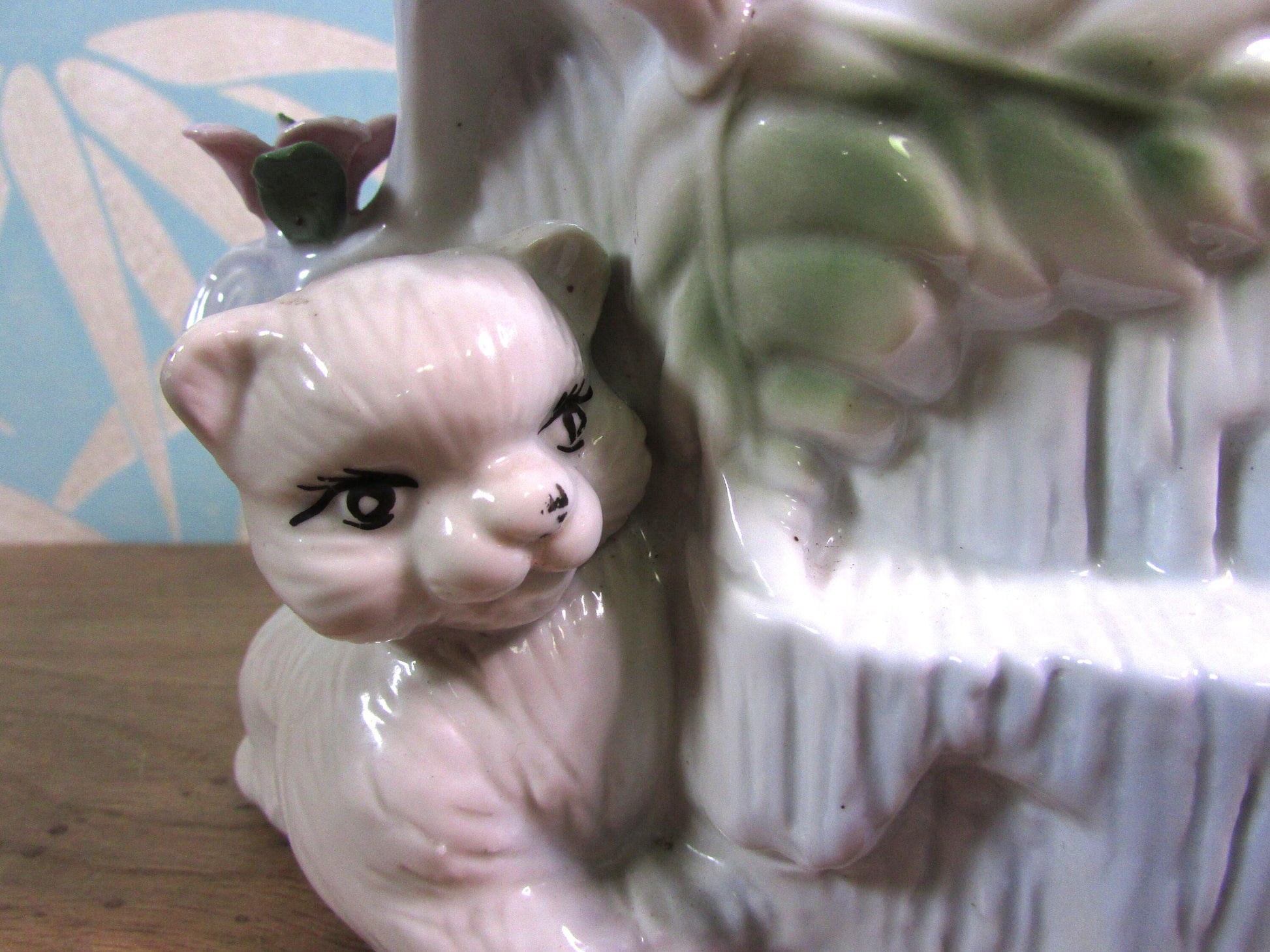 Kitsch vintage hiding kittens and log planter