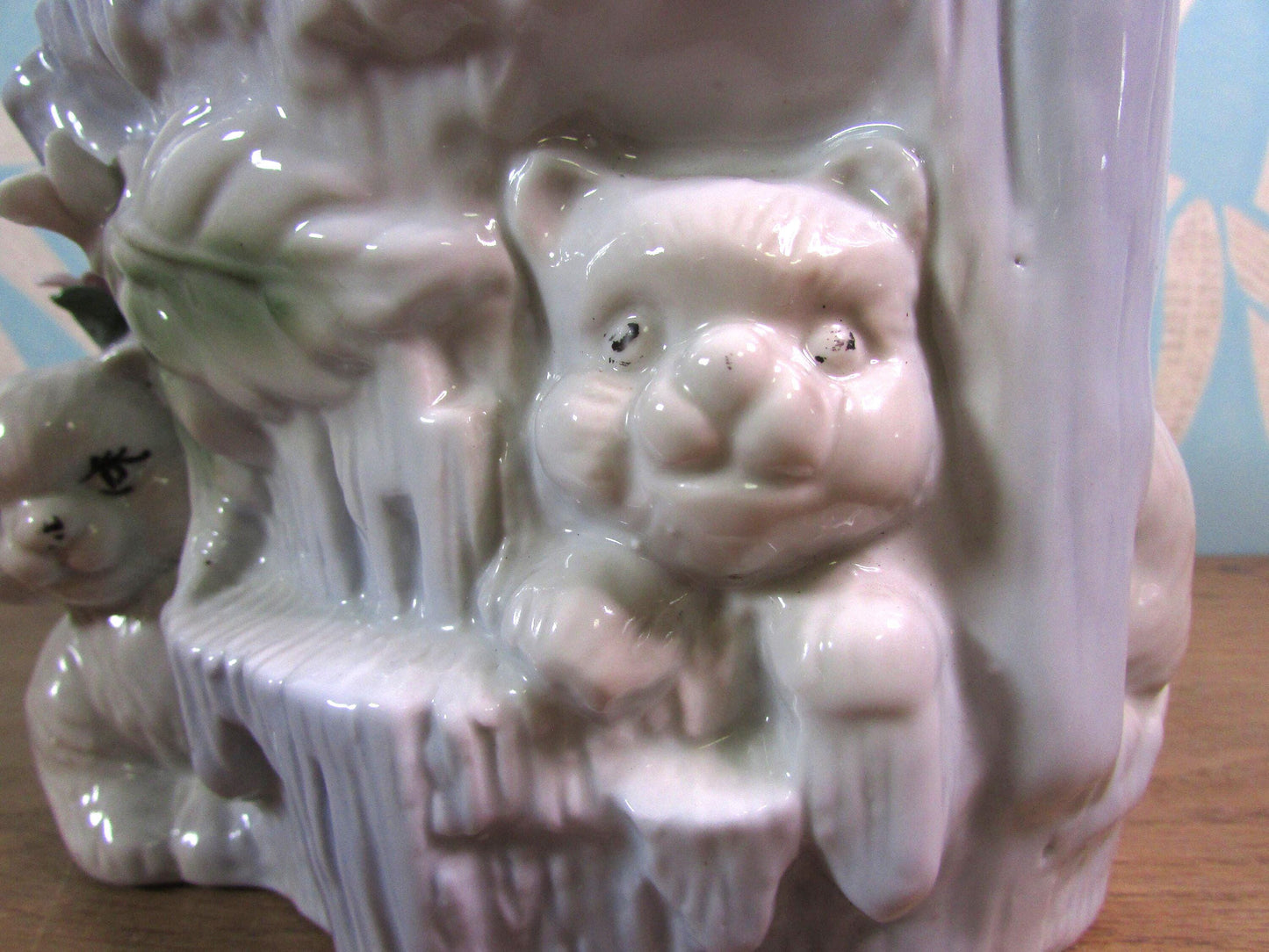 Kitsch vintage hiding kittens and log planter