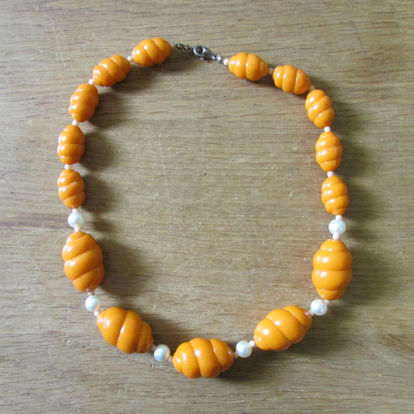 Vintage plastic caramel twisted bead collar length necklace, faux pearl spacers