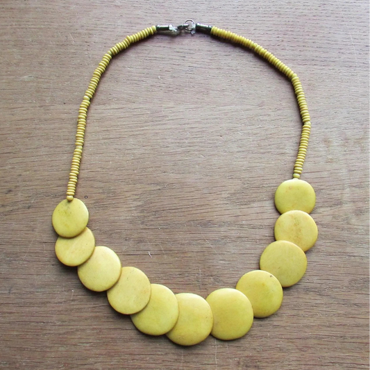 1970s yellow/mustard graduating flat disc Tagua nut necklace