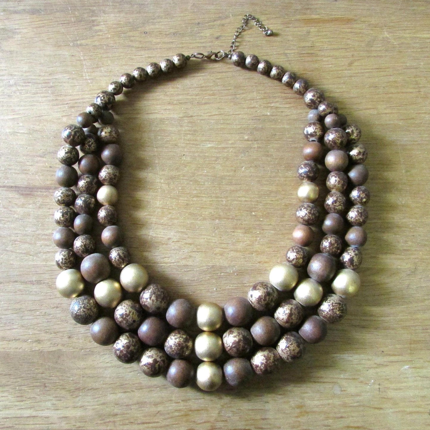 1980s brown, bronze & gold triple strand wooden bead necklace