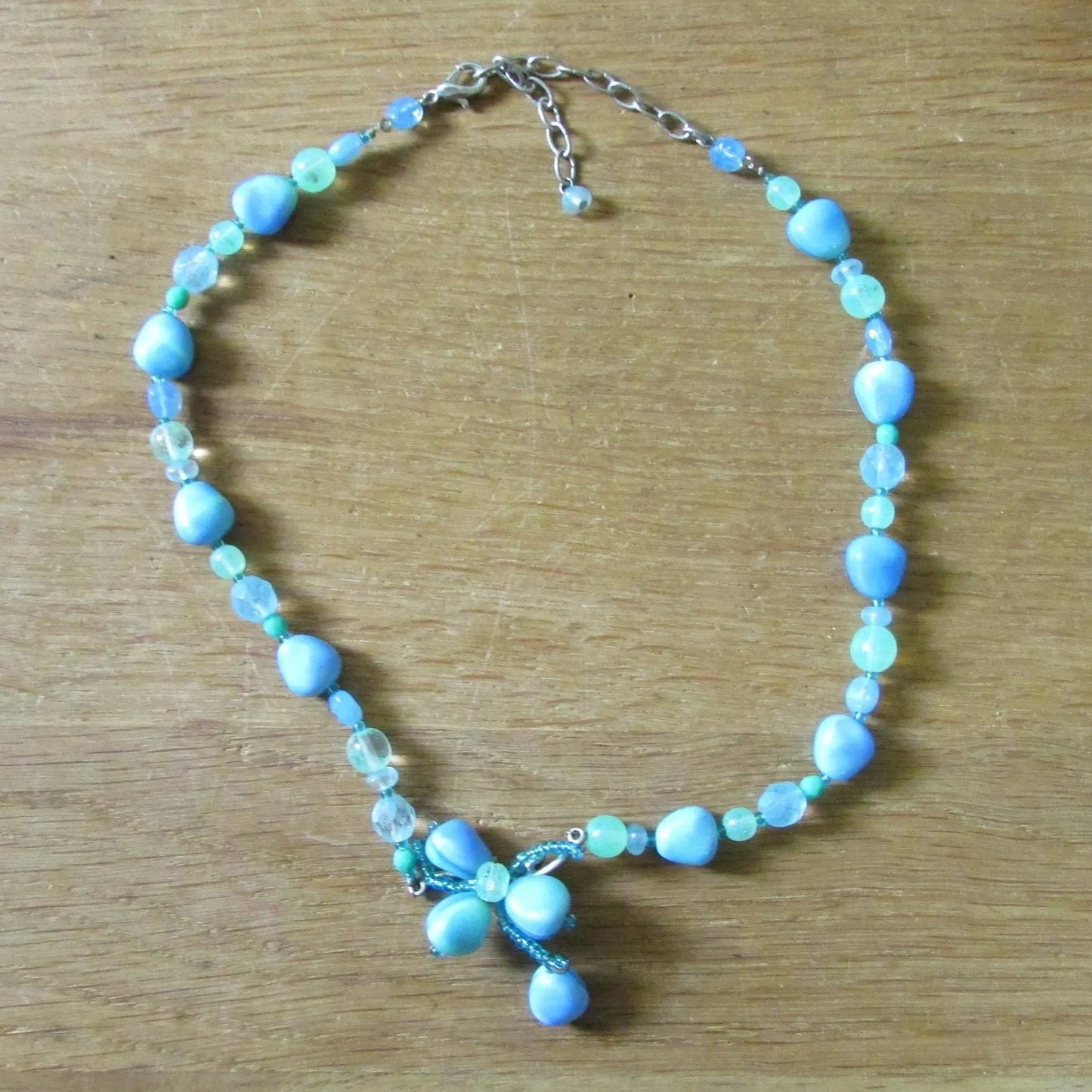 Y2K aqua blue tone glass bead statement necklace with flower bead detail
