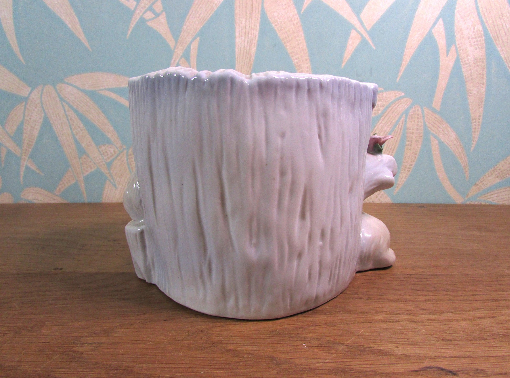 Kitsch vintage hiding kittens and log planter