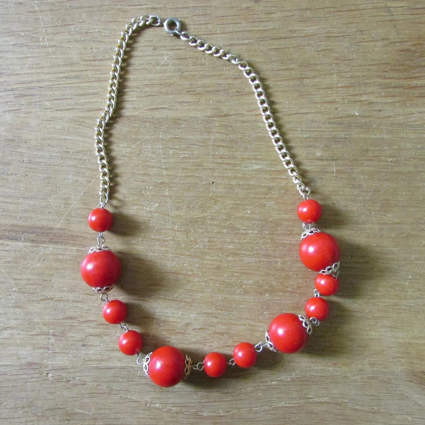1980s red graduated round plastic bead necklace