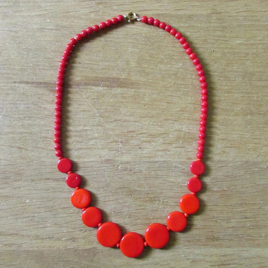 1960s cherry red flat graduating glass disc bead necklace