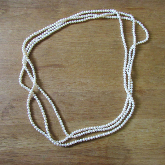 Vintage 1920s-style extra long pearl rope necklace