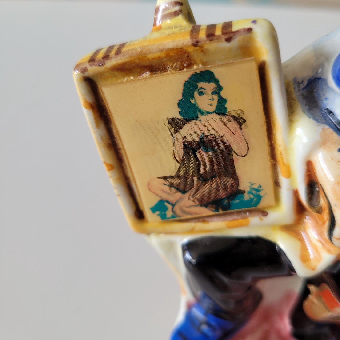 1960s Drioli miniature liquor bottle/decanter: artist & risqué painting, animated