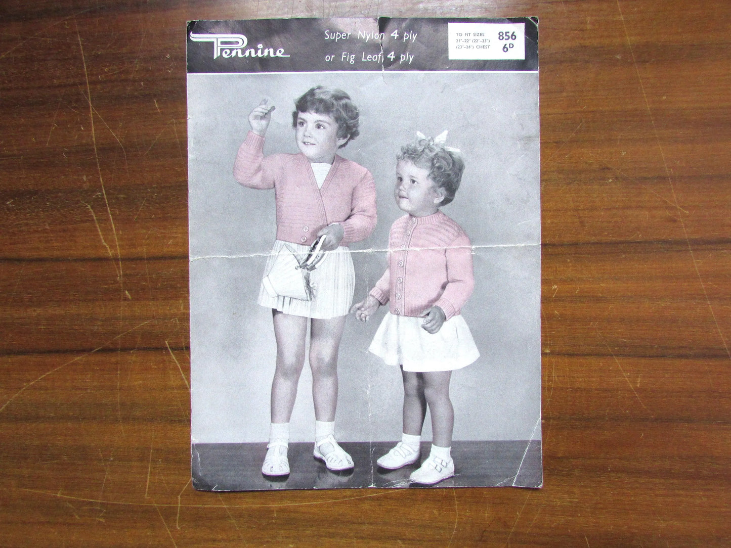 1950s Pennine 856 knitting pattern for girl's windcheater, & cross-over cardigans