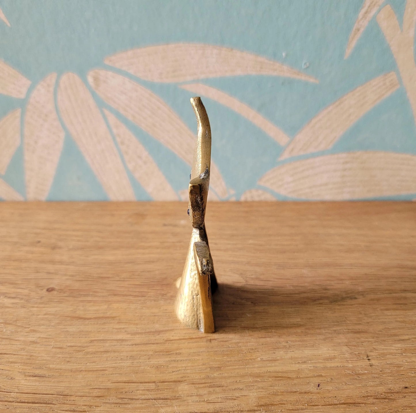 1960s brass kitten ring holder with jewel eyes