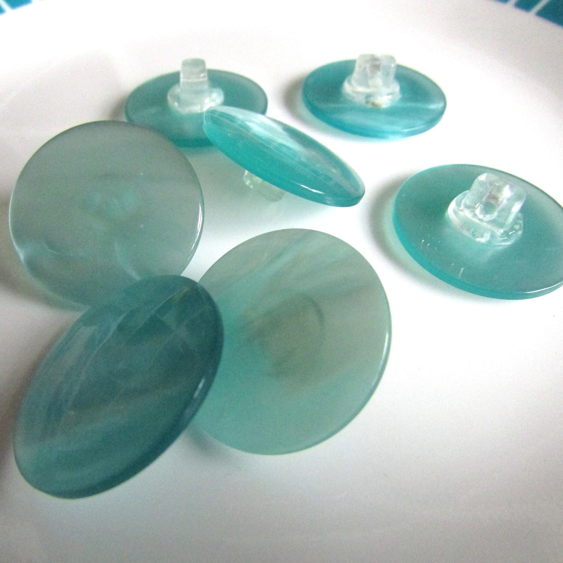 7 vintage pearlescent aqua flat round plastic buttons