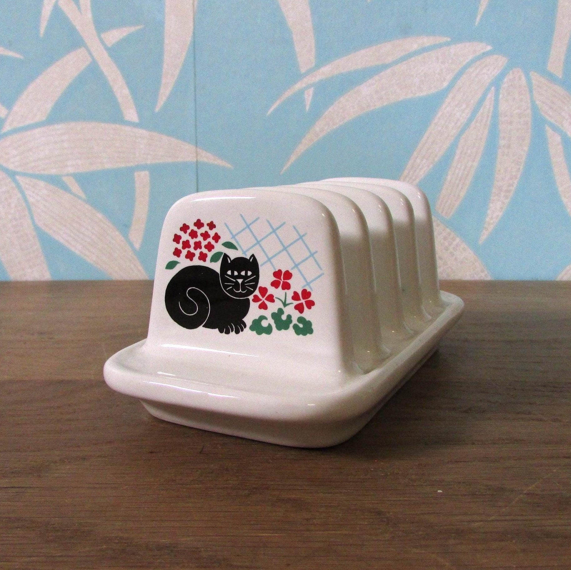 1980s Sadler ceramic toast rack depicting black cat & flowers