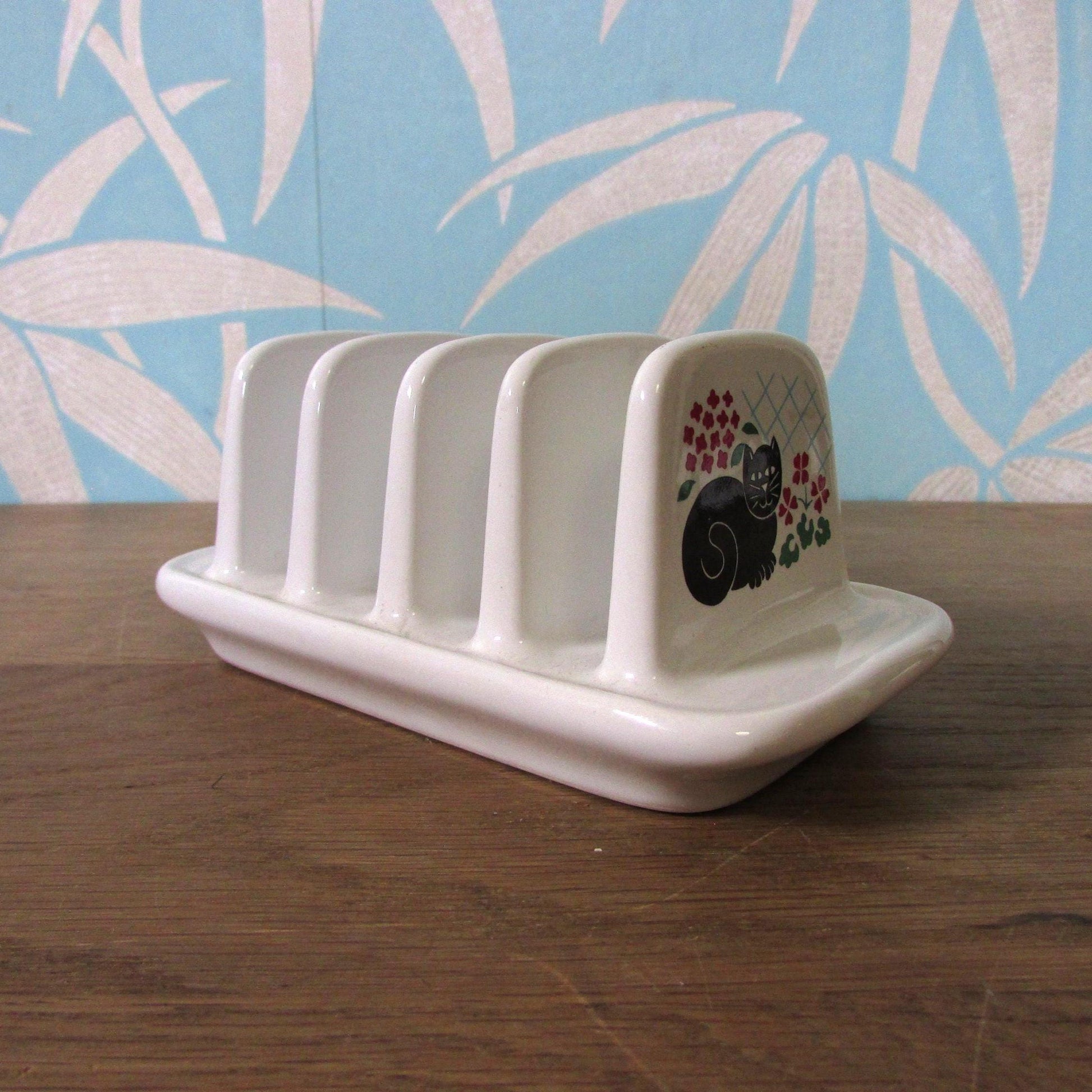 1980s Sadler ceramic toast rack depicting black cat & flowers