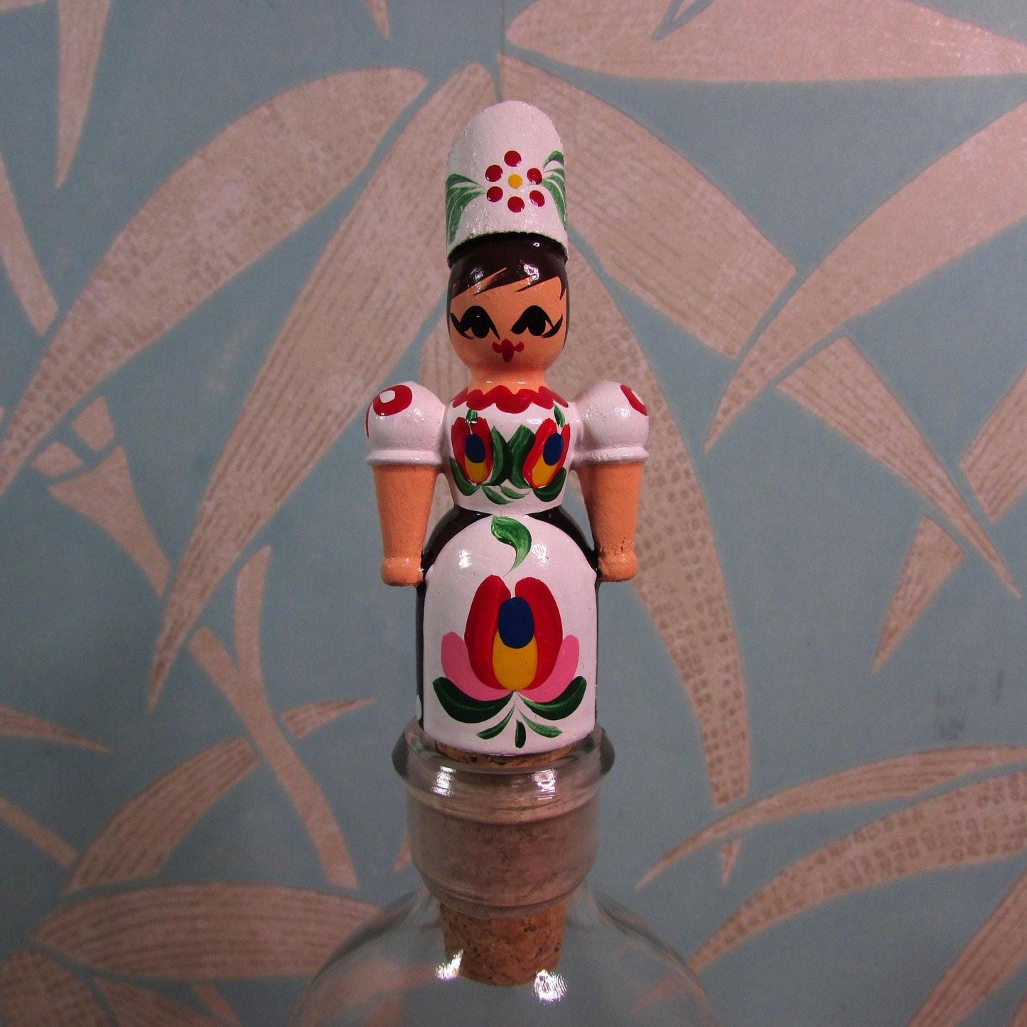 Kitsch vintage hand-painted girl in traditional folk costume cork bottle stopper