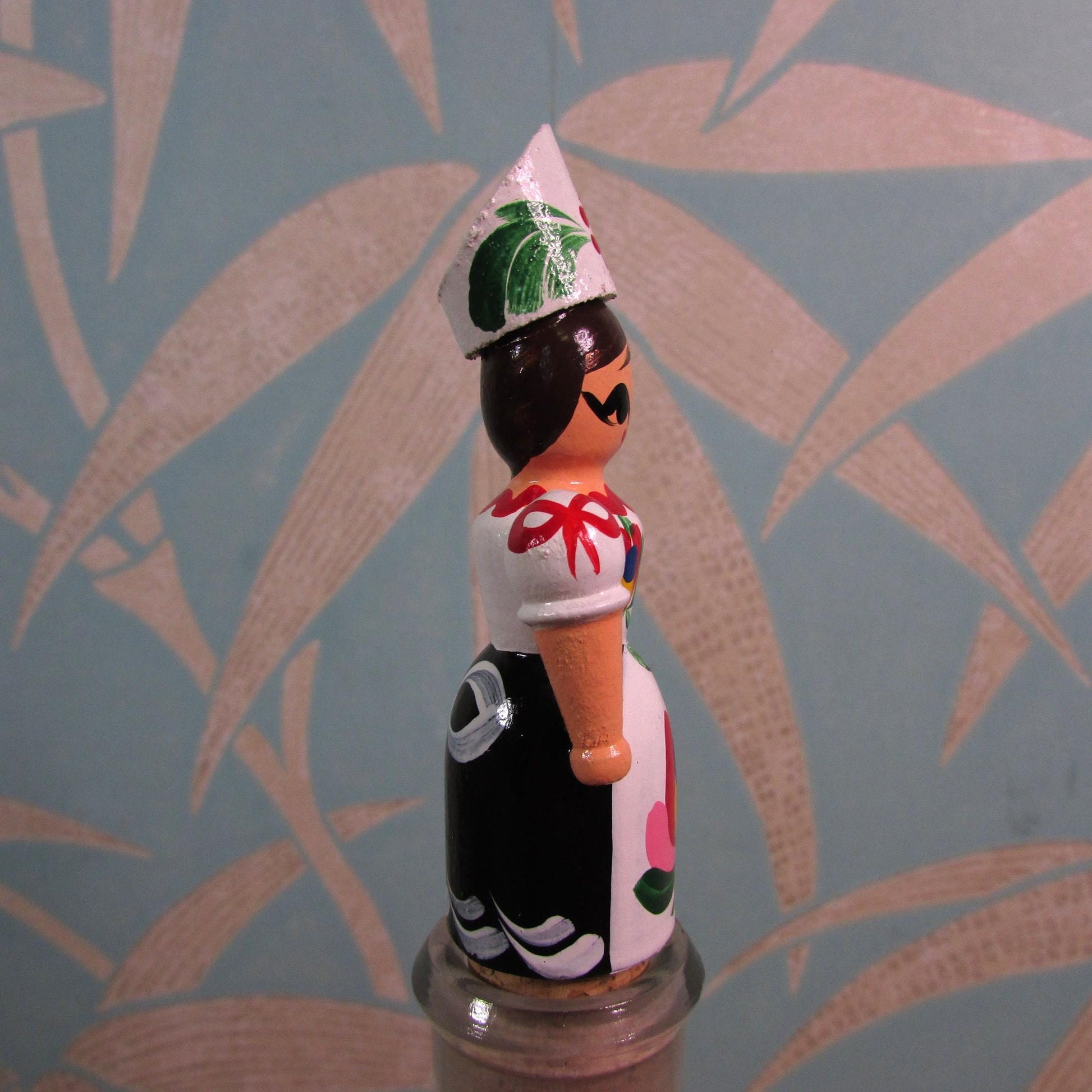 Kitsch vintage hand-painted girl in traditional folk costume cork bottle stopper