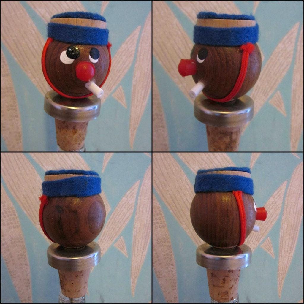 Three 1960s Gonk-style wooden character bottle stoppers/pourouts