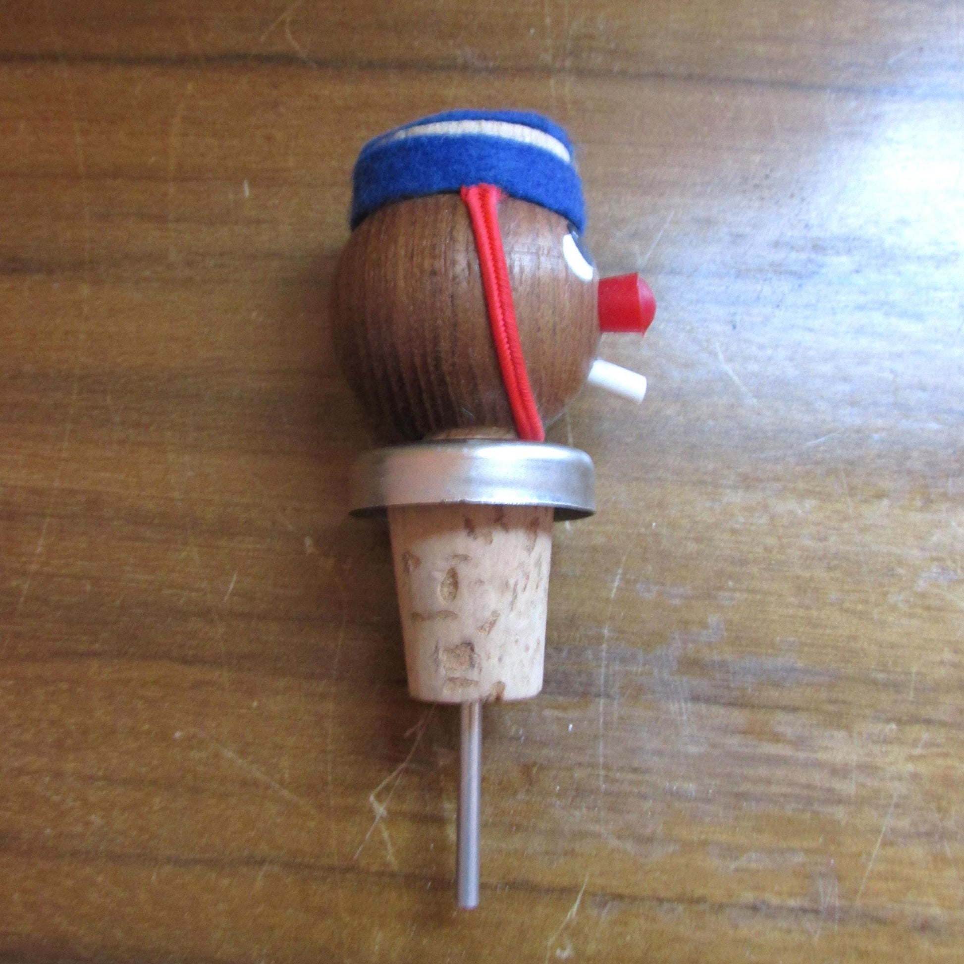 Three 1960s Gonk-style wooden character bottle stoppers/pourouts