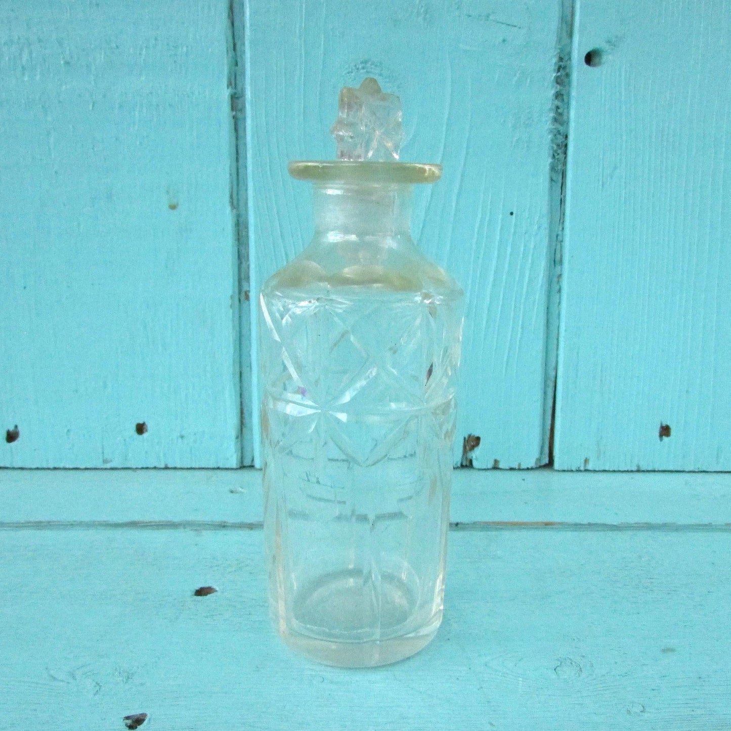 Vintage miniature cut glass perfume bottle with stopper
