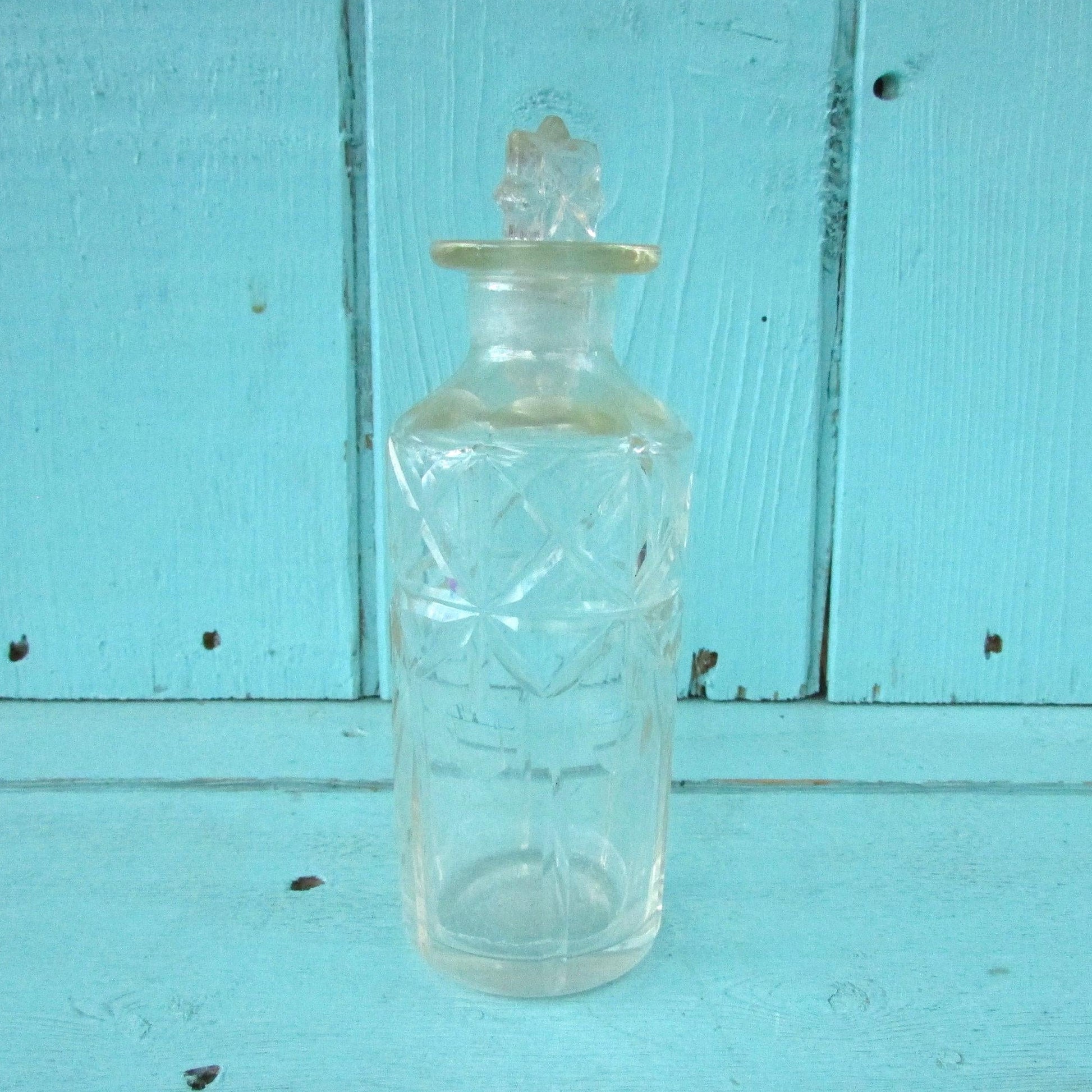 Vintage miniature cut glass perfume bottle with stopper
