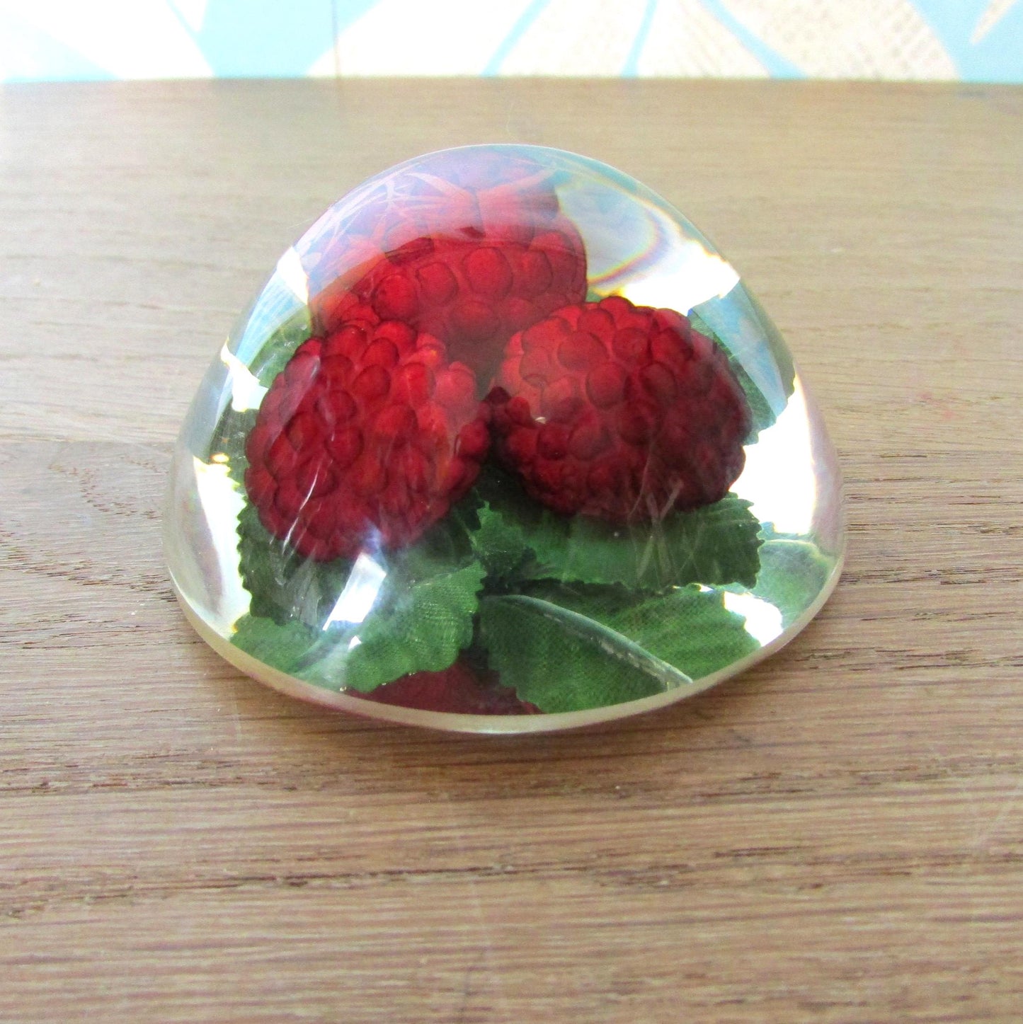 1960s kitsch acrylic domed raspberries paperweight