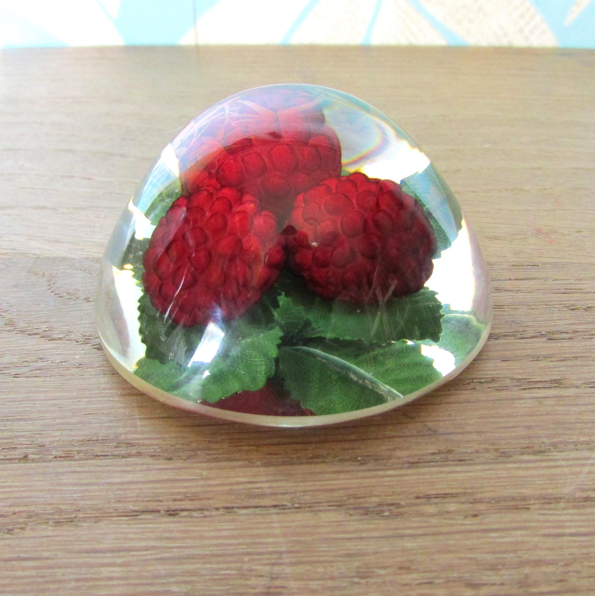 1960s kitsch acrylic domed raspberries paperweight