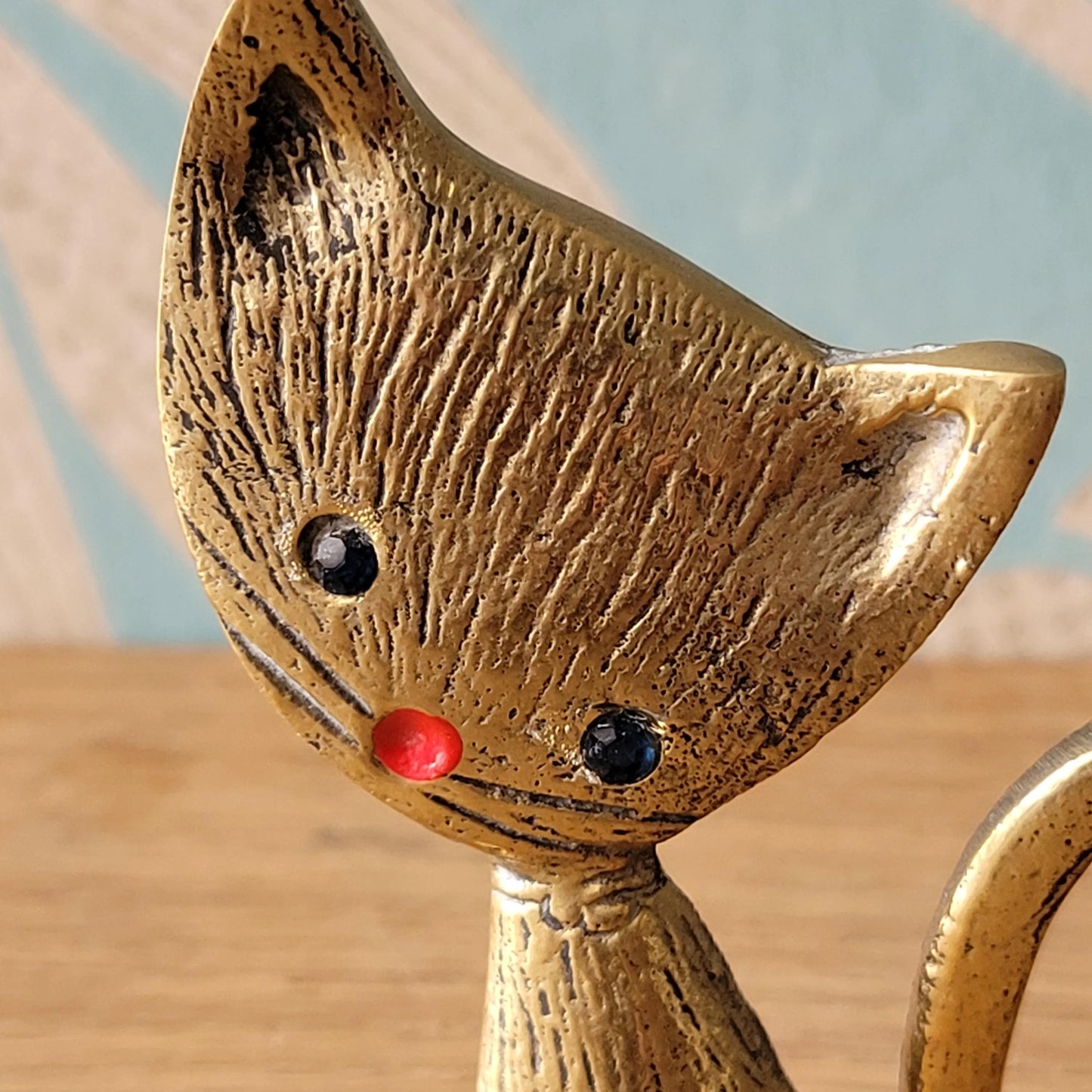 1960s brass kitten ring holder with jewel eyes