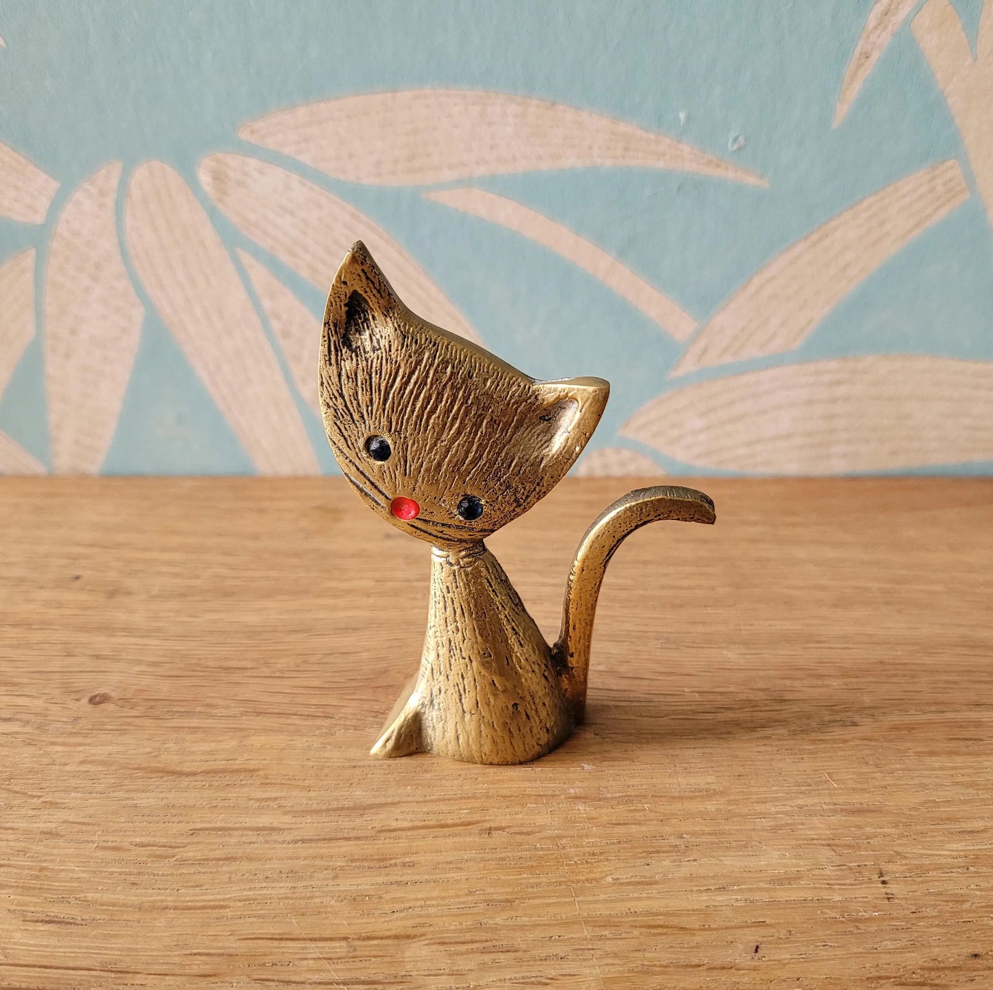 1960s brass kitten ring holder with jewel eyes