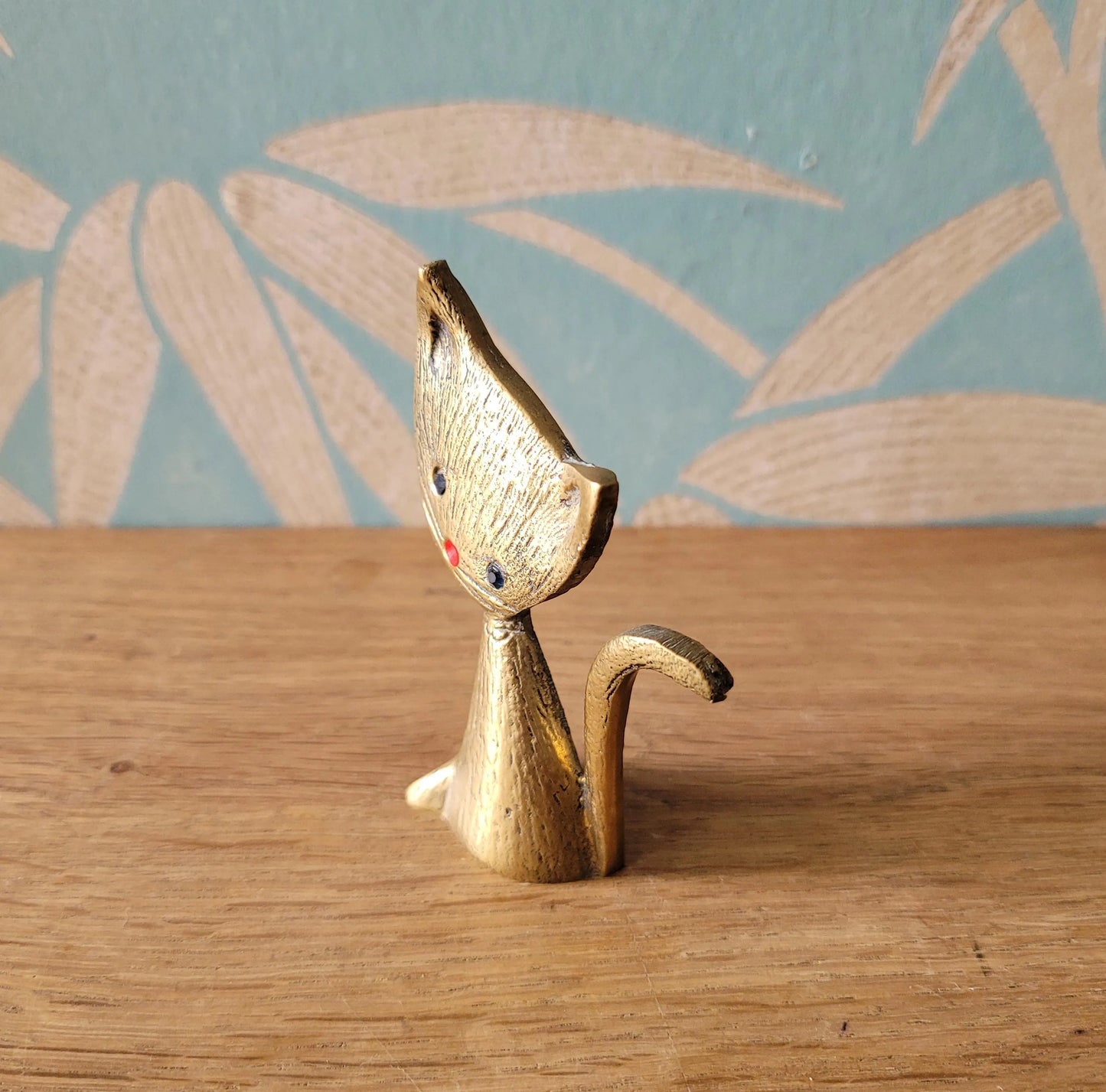 1960s brass kitten ring holder with jewel eyes