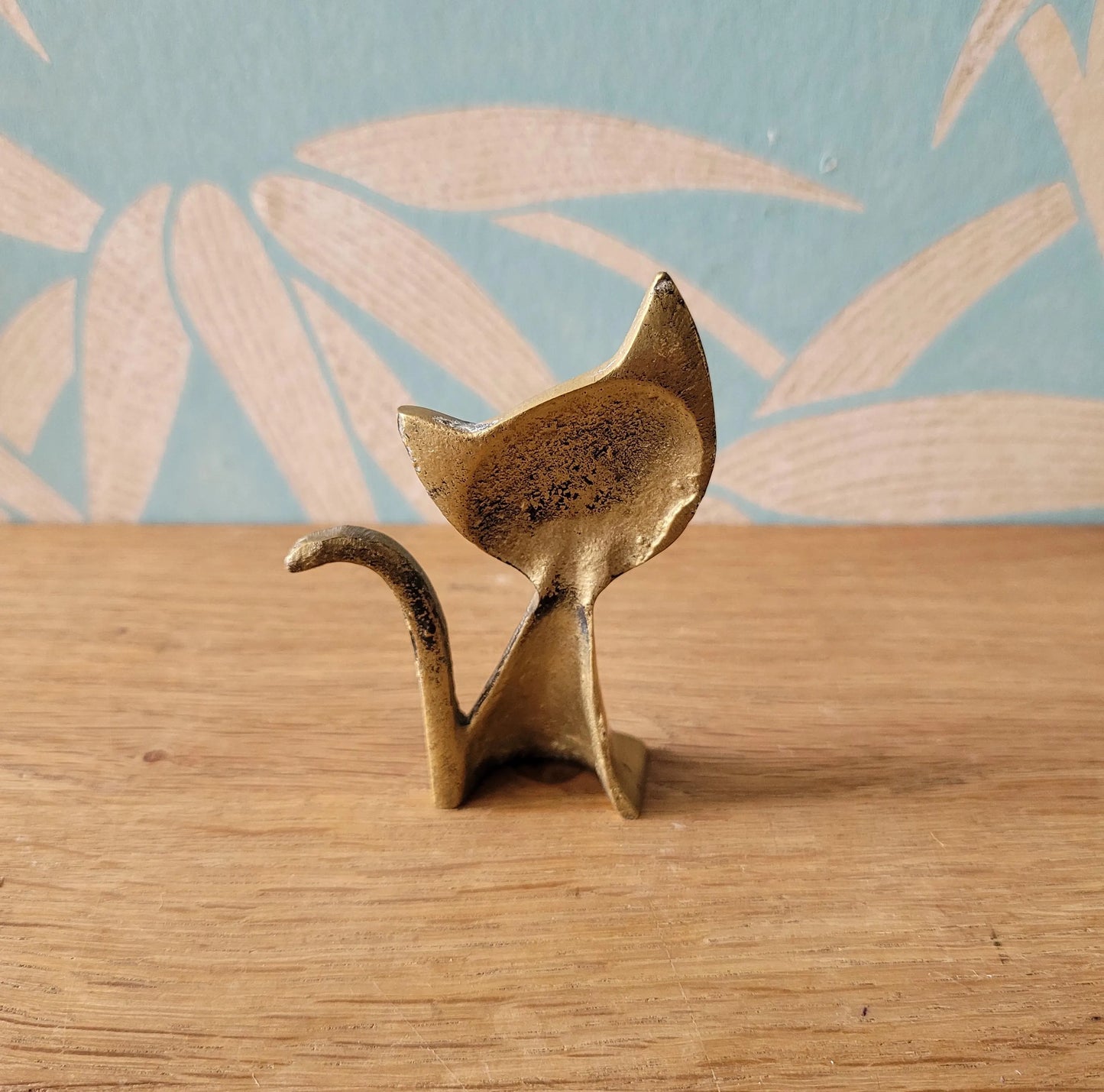 1960s brass kitten ring holder with jewel eyes