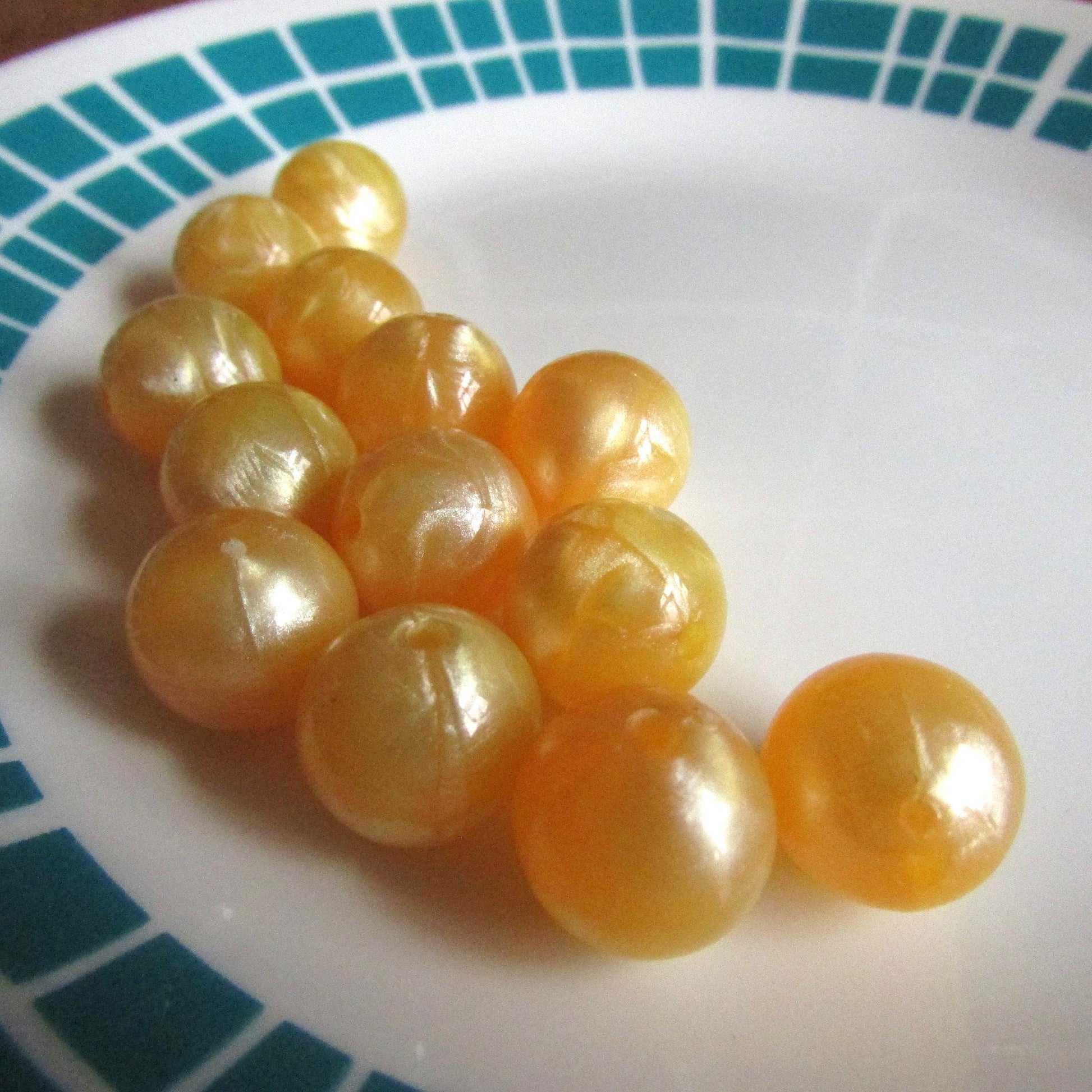 13 vintage pearlescent lemon yellow/orange round plastic beads