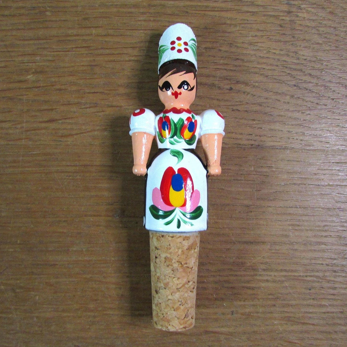 Kitsch vintage hand-painted girl in traditional folk costume cork bottle stopper