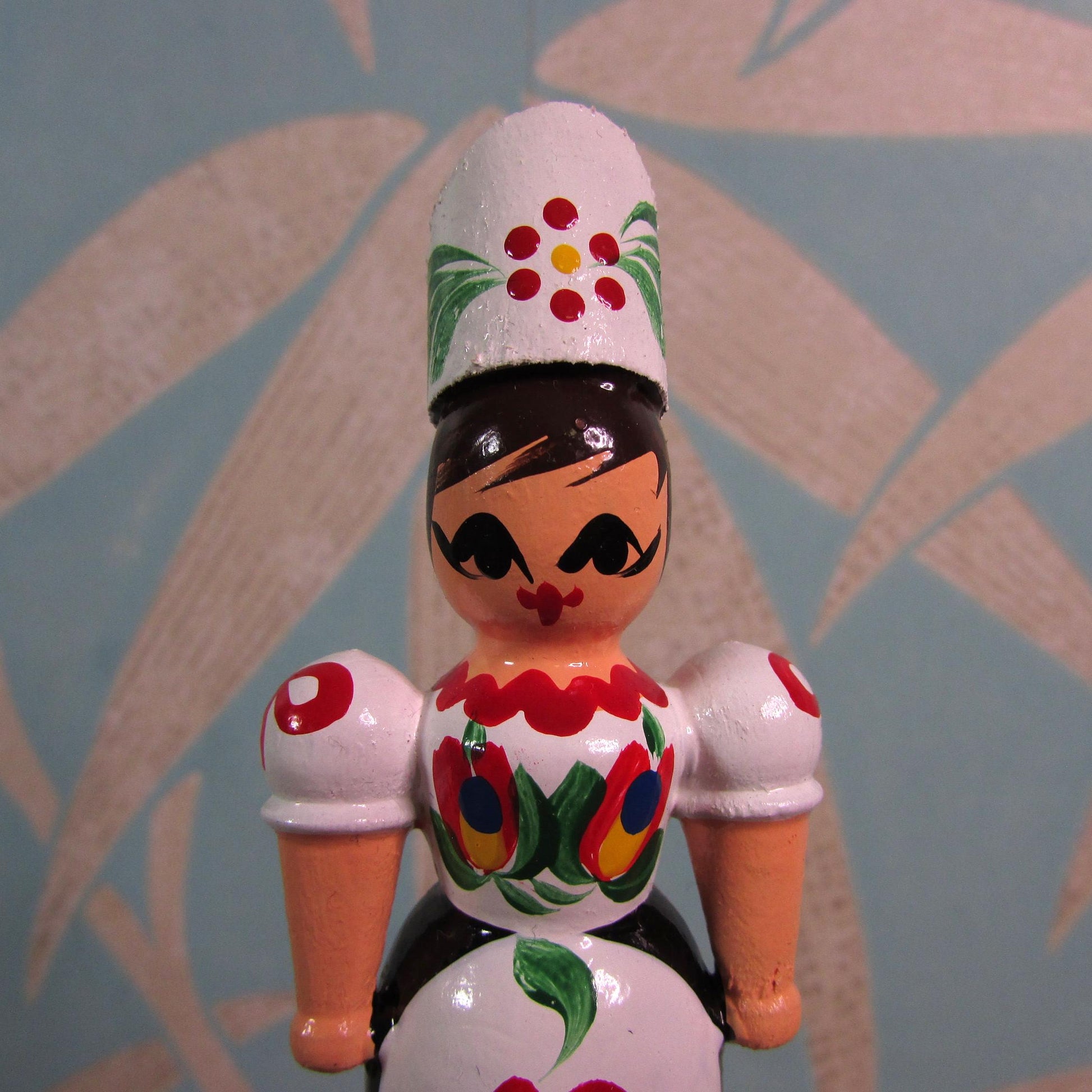 Kitsch vintage hand-painted girl in traditional folk costume cork bottle stopper