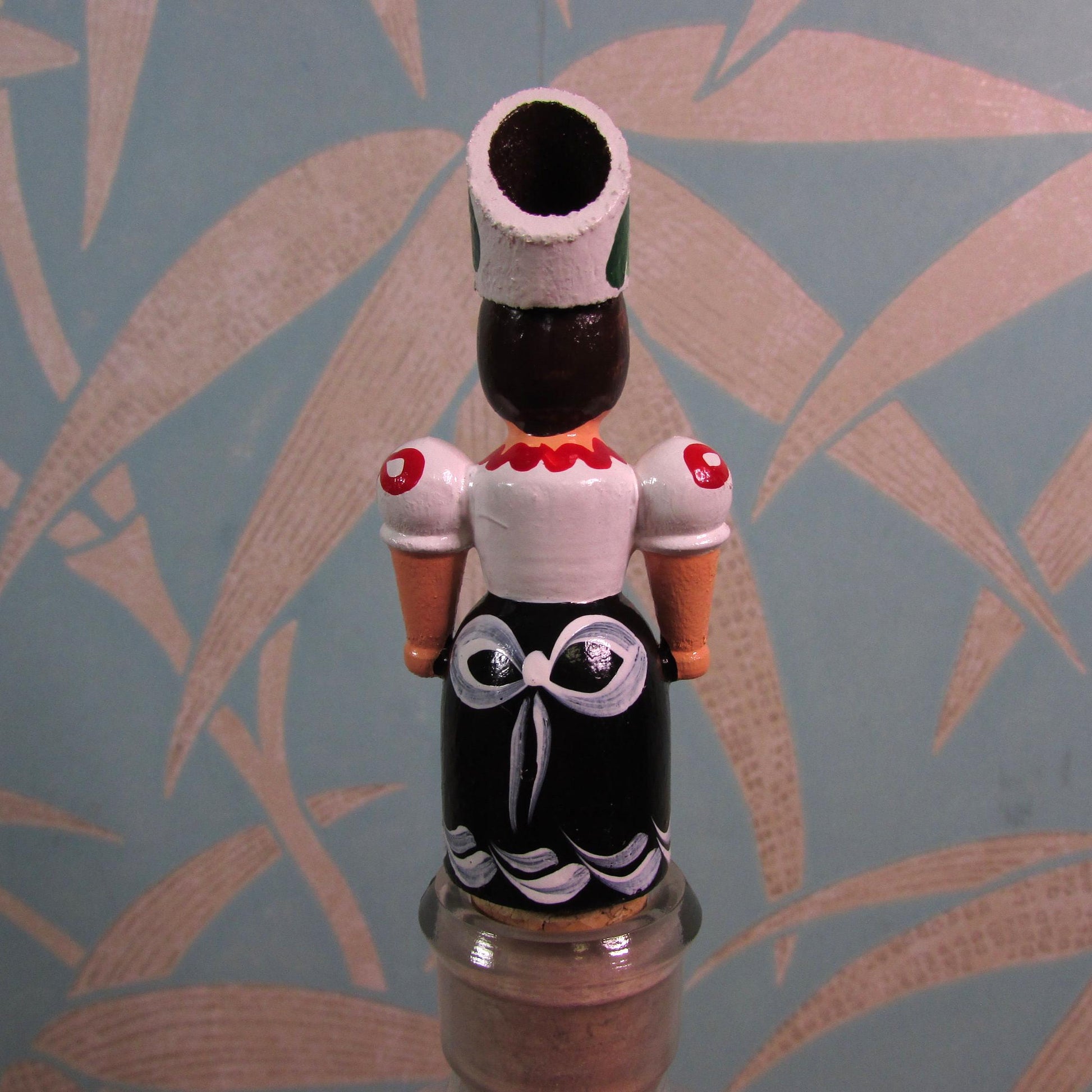 Kitsch vintage hand-painted girl in traditional folk costume cork bottle stopper