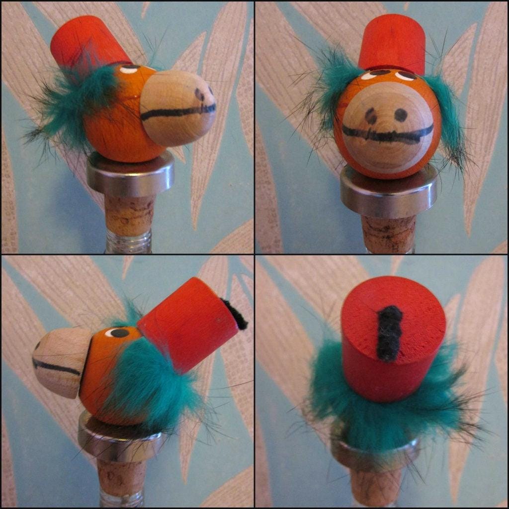 Three 1960s Gonk-style wooden character bottle stoppers/pourouts