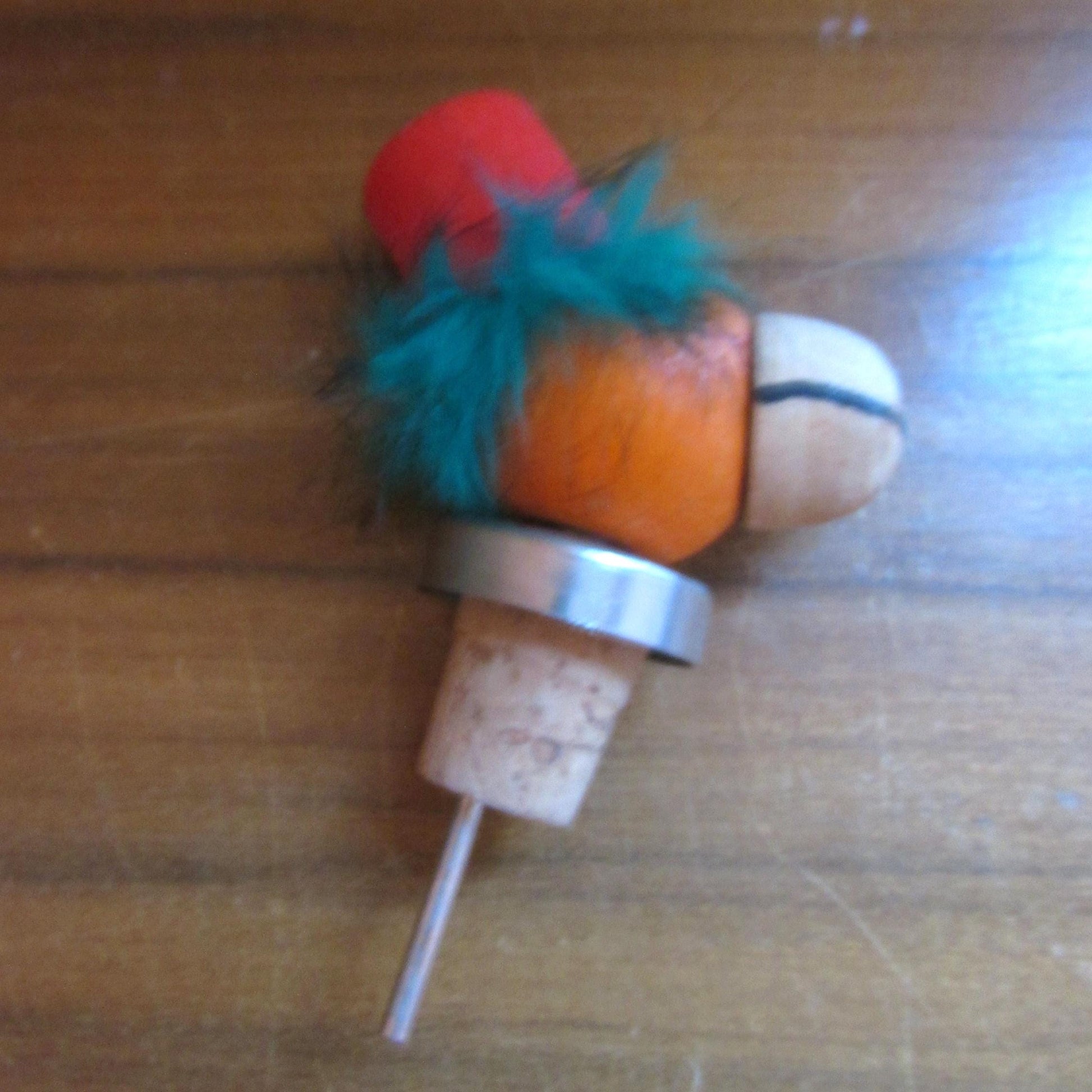 Three 1960s Gonk-style wooden character bottle stoppers/pourouts