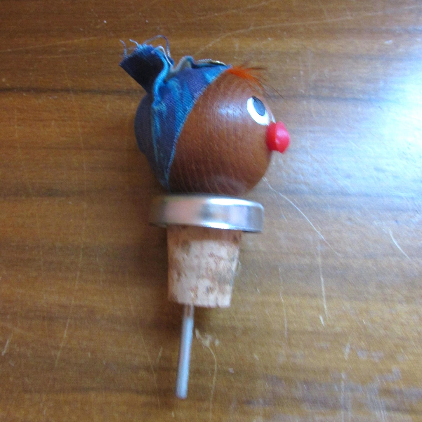 Three 1960s Gonk-style wooden character bottle stoppers/pourouts