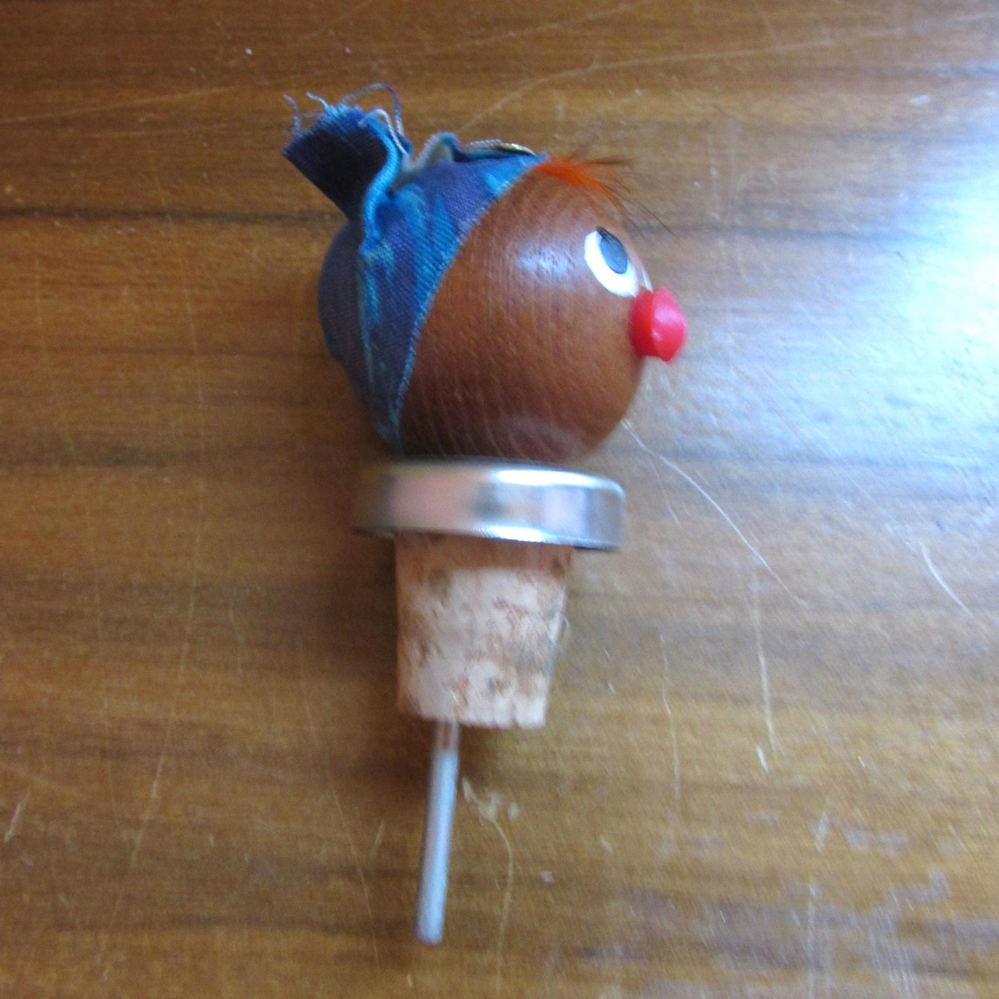 Three 1960s Gonk-style wooden character bottle stoppers/pourouts
