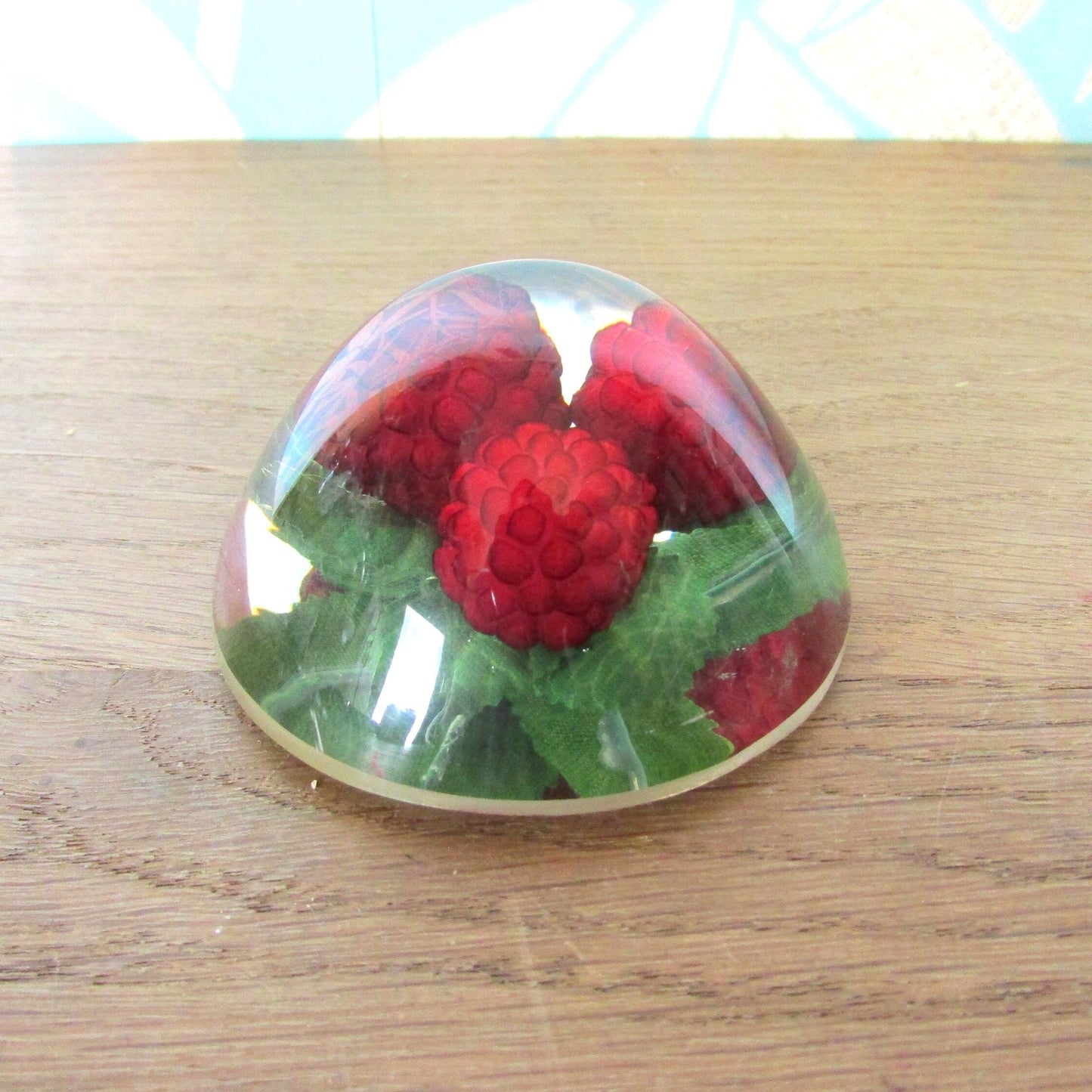 1960s kitsch acrylic domed raspberries paperweight