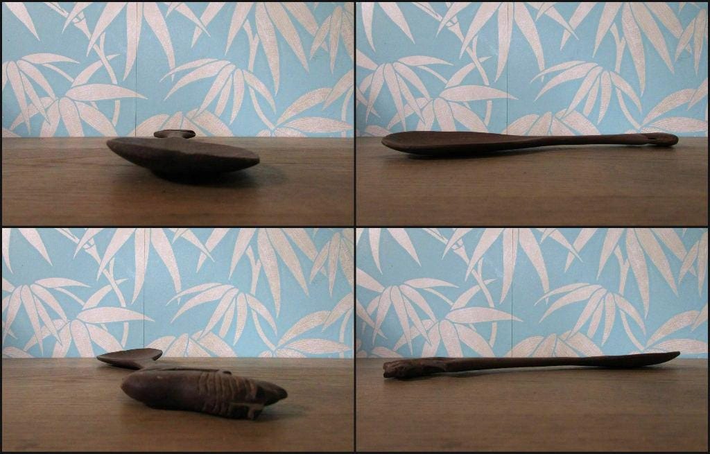Pair of vintage hand carved wood lion salad servers
