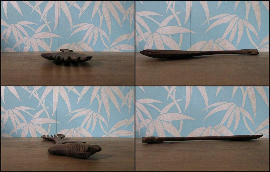 Pair of vintage hand carved wood lion salad servers