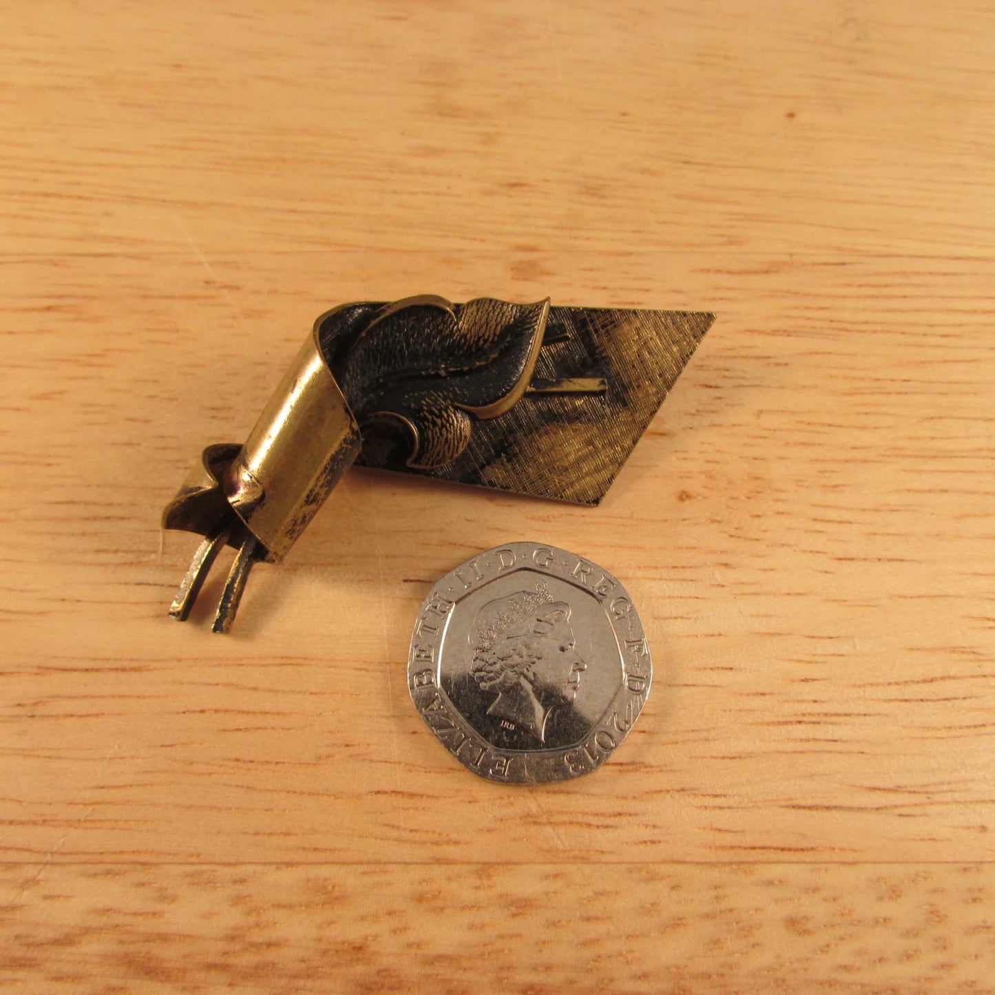 Vintage German gold-tone scroll leaf brooch